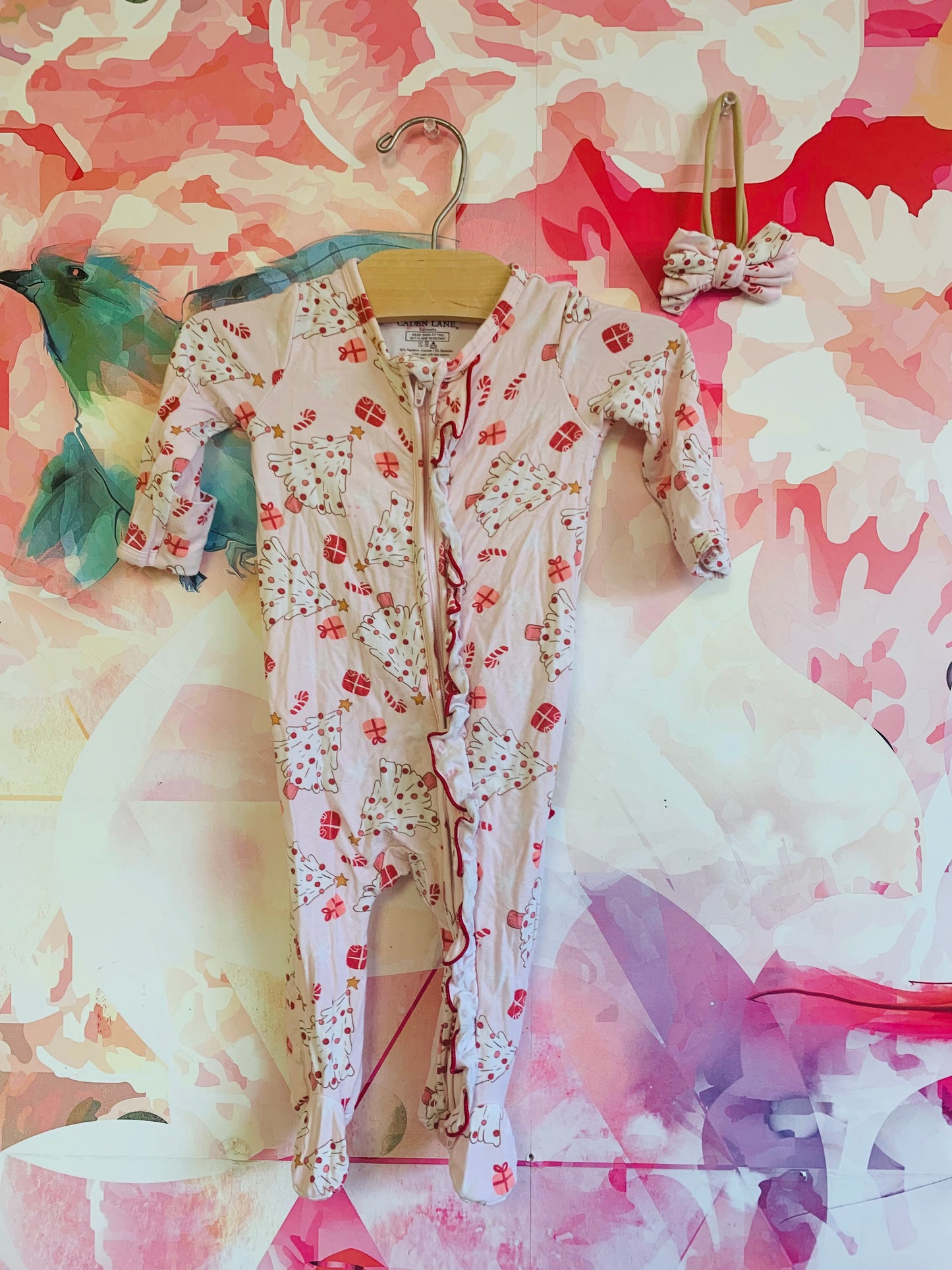 Caden Lane pink & red long sleeve romper with Xmas trees & presents. Red ruffle on back. Size 0-3m / NB