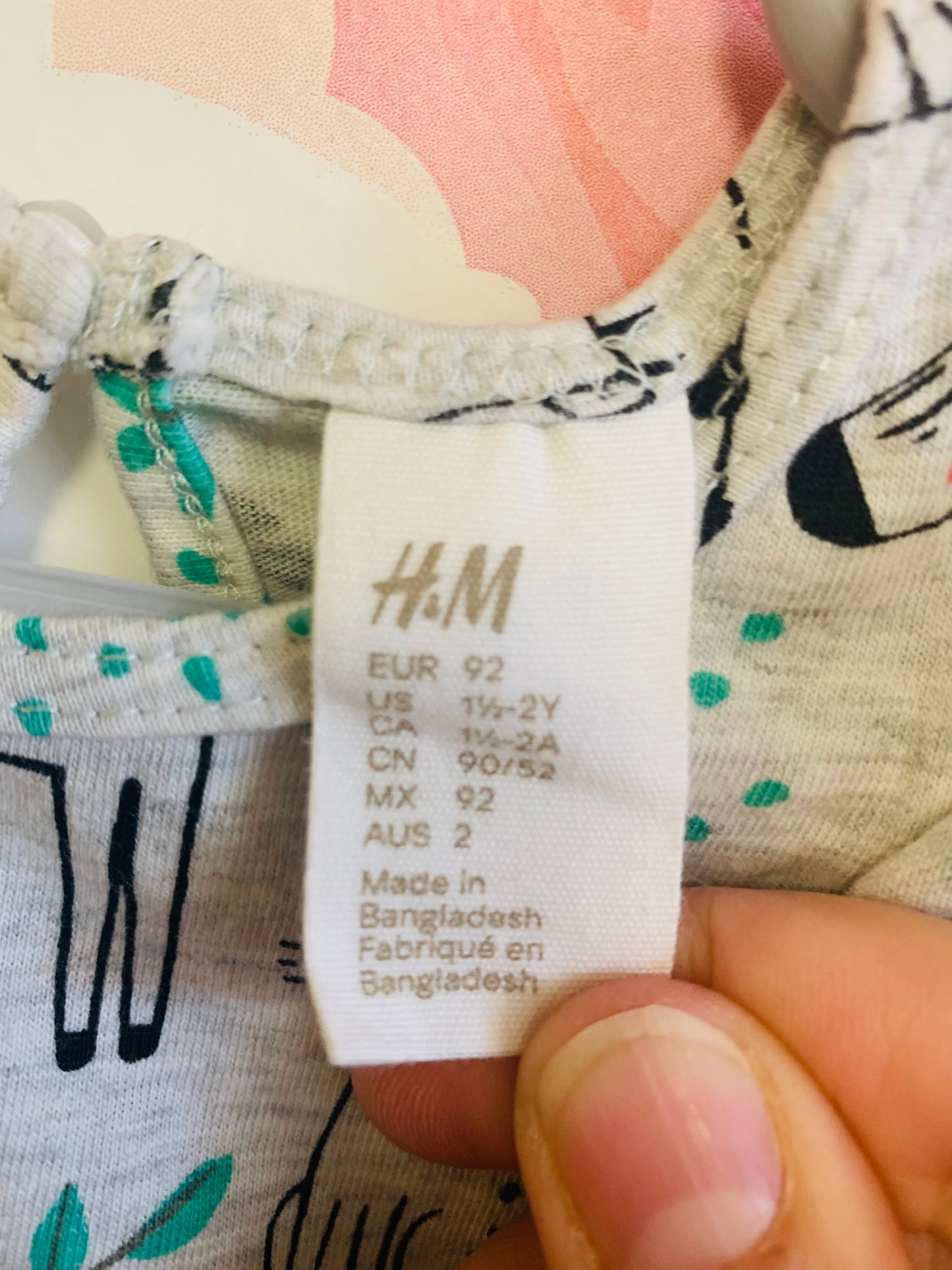 H&M sleeveless dresses. Pink with strawberries & grey with animals. Size 18-24m.