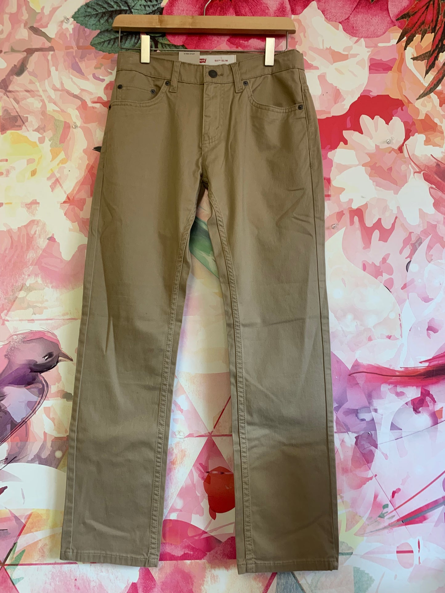 Levi’s khaki pants. *New with Tags*. adjustable waistband slim from hip to ankle with stretch. Size 14