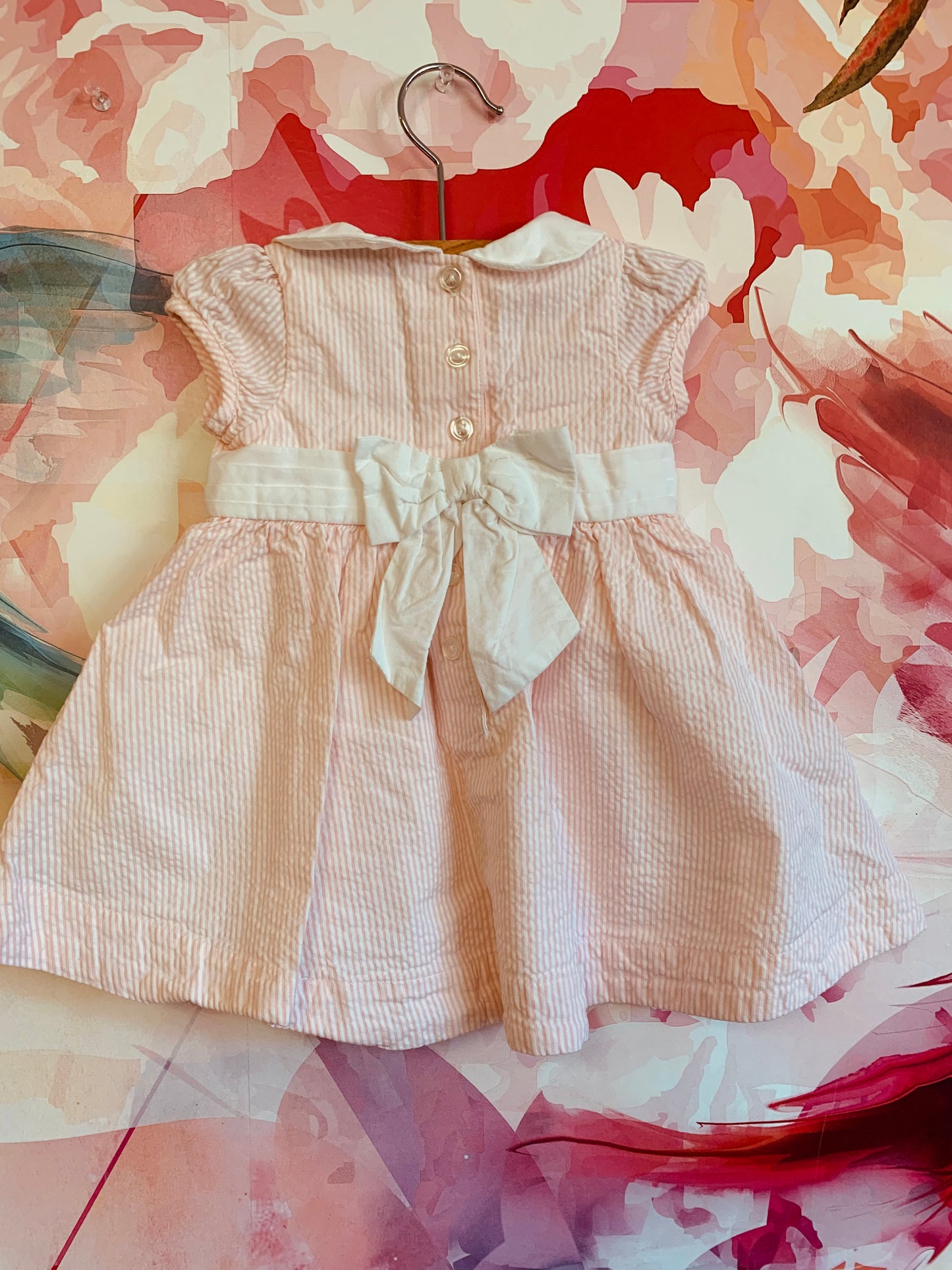 Hope & Henry organic cotton pink/white stripe short sleeve dress. White waist sash with bow in back. Size 3-6m