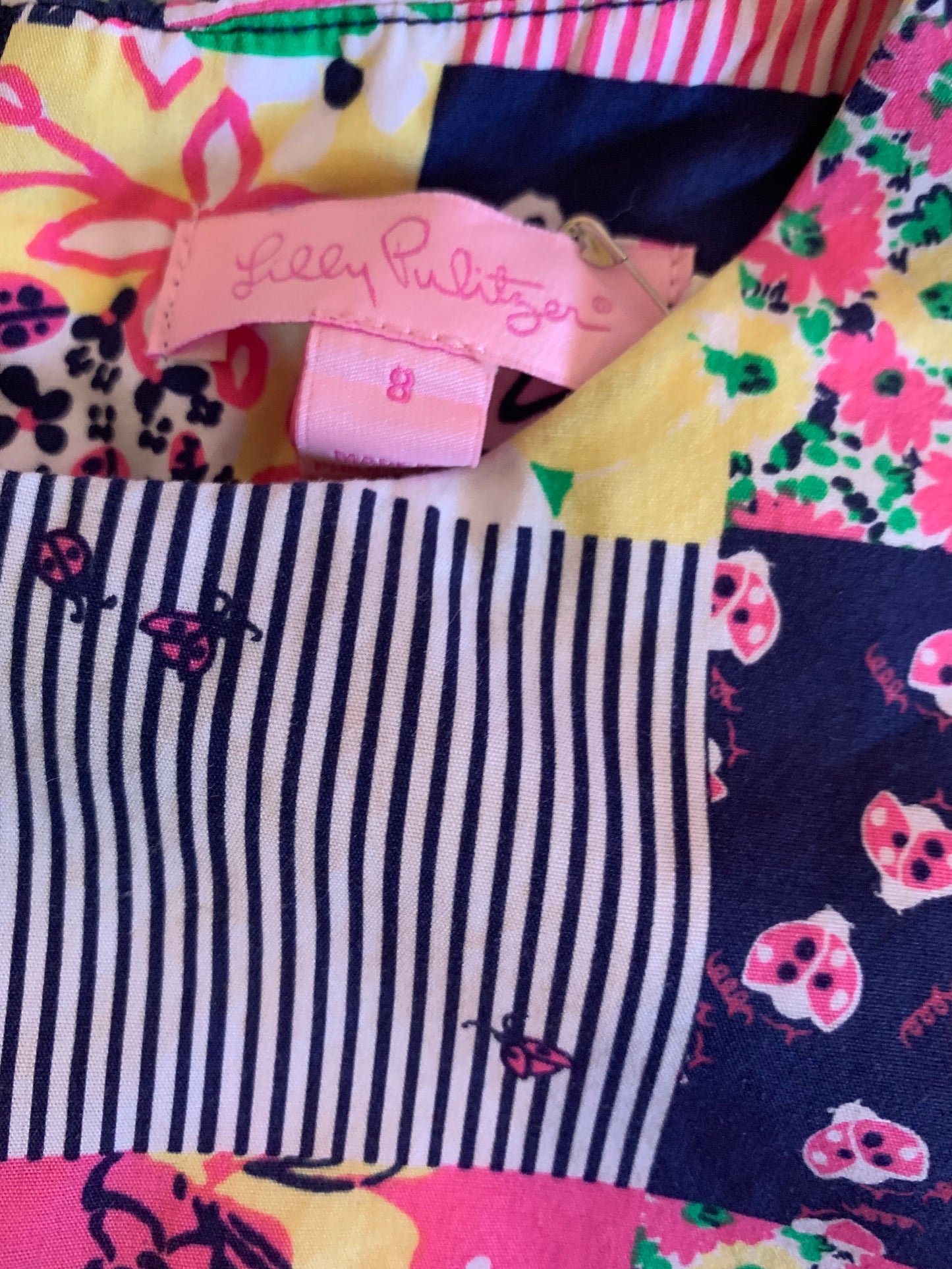 Lilly Pulitzer colorful floral stripe block sleeveless shift dress. Zipper back. Size 8