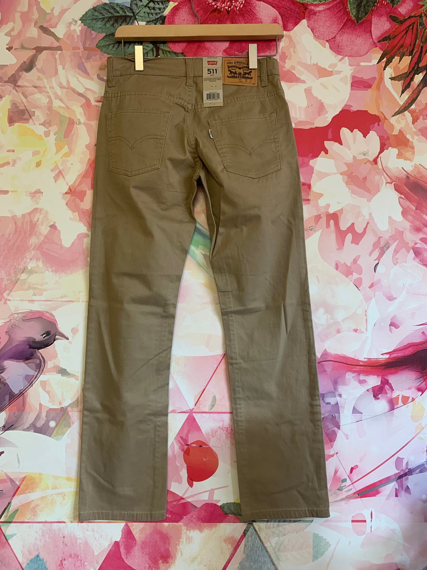 Levi’s khaki pants. *New with Tags*. adjustable waistband slim from hip to ankle with stretch. Size 14