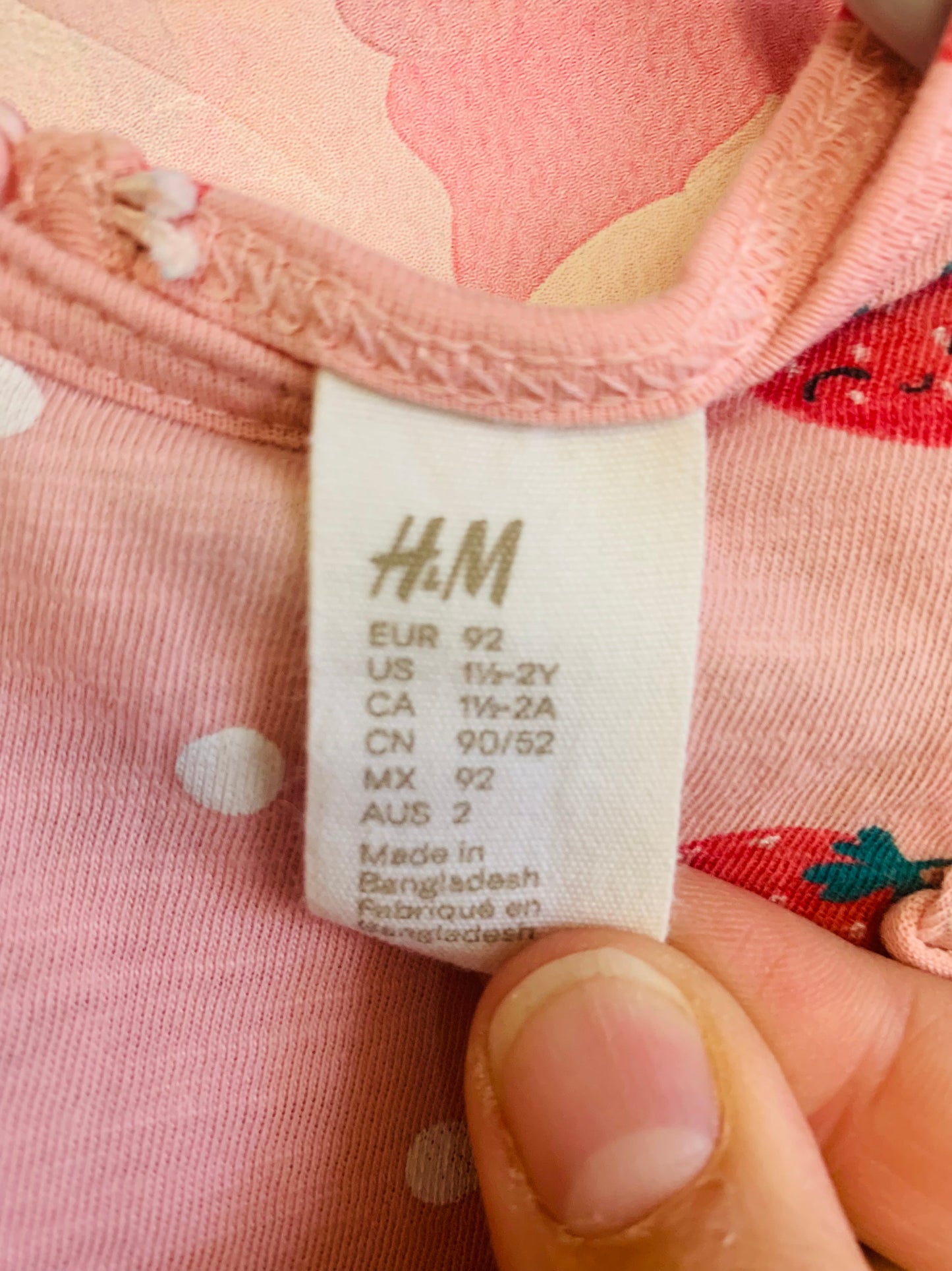 H&M sleeveless dresses. Pink with strawberries & grey with animals. Size 18-24m.