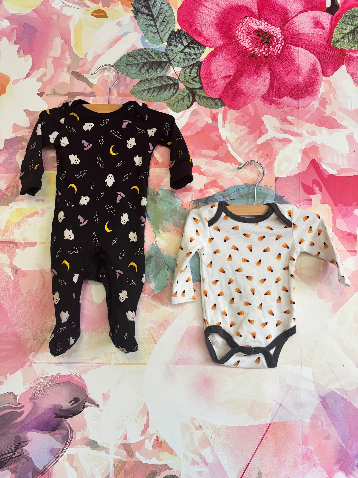 okie dokie black long sleeve footed romper with Halloween ghosts, bats, witch hats, moons. Size 0-3m. Chickpea white long sleeve onesie with orange & black Halloween candy corns. Size 0-3m / NB