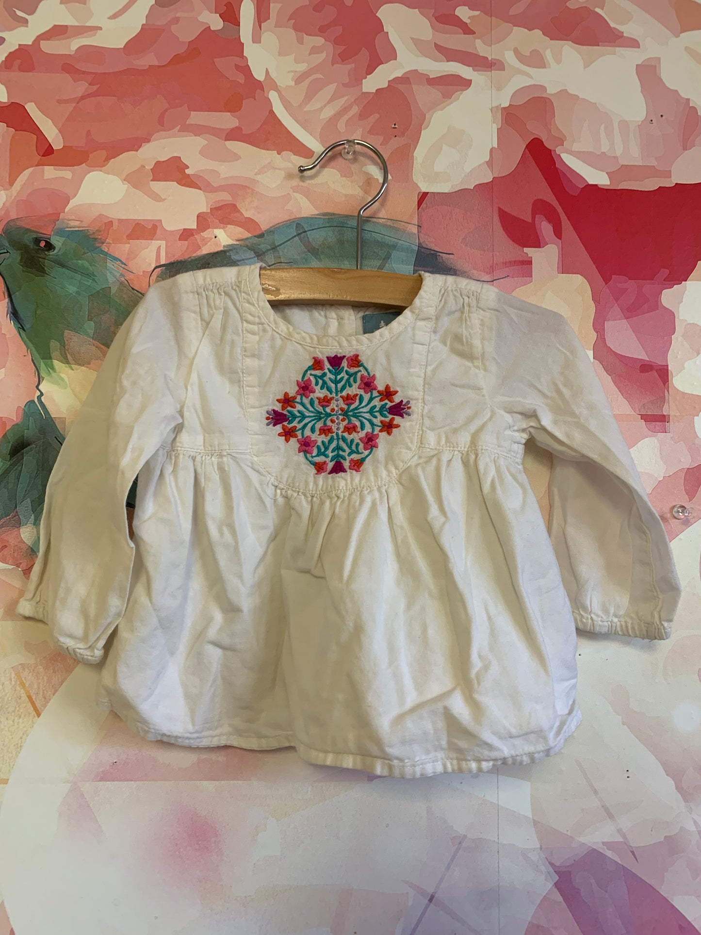 Baby Gap white long sleeve blouse with red, pink, purple flower embroidery. Size 6-12m