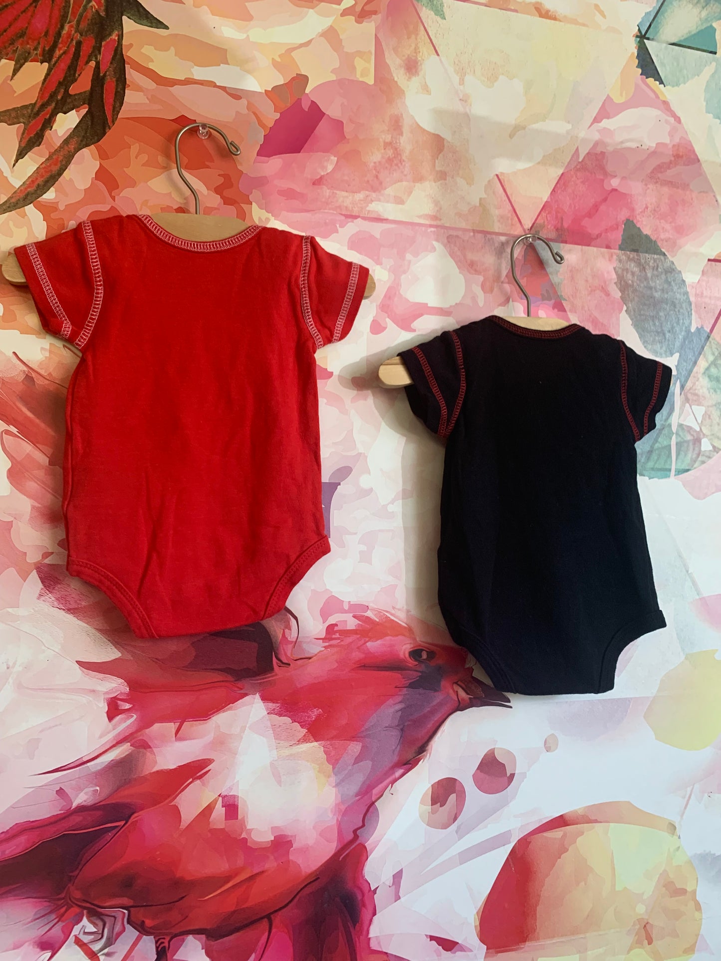 NBA Chicago Bulls red & black onesies. Size 0-3m / NB