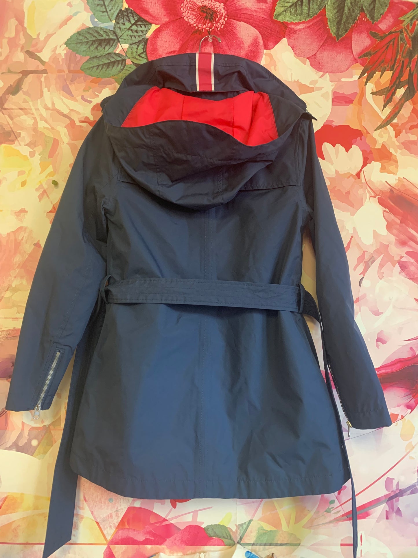 Helly Hansen blue hooded raincoat with bright pink lining. Size Adult S/P.