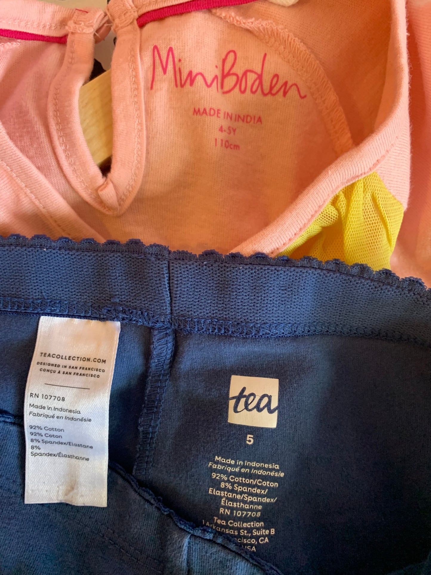 Mini Boden rainbow ruffle short sleeve top and Tea Collection blue leggings. Both size 5T