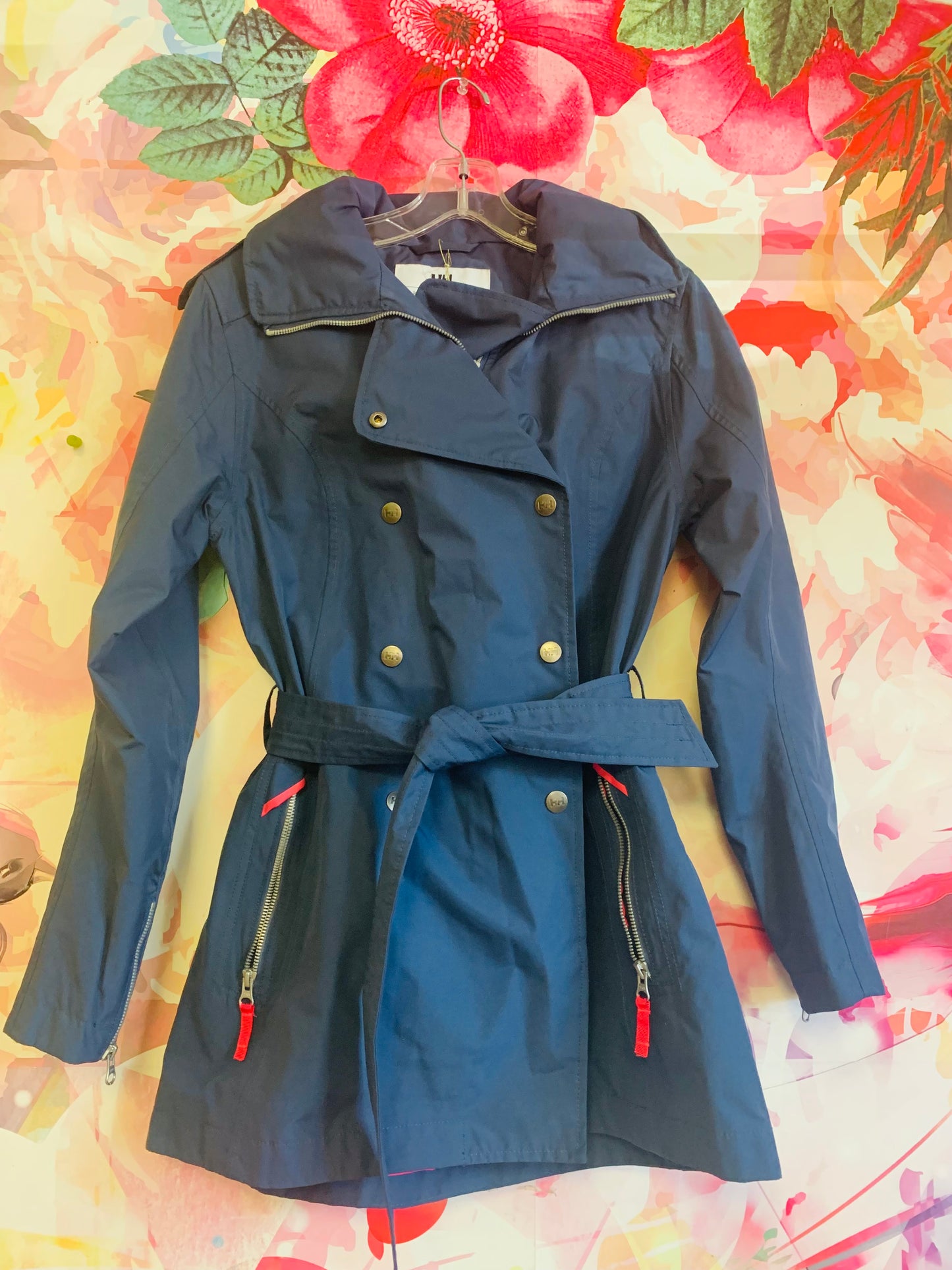 Helly Hansen blue hooded raincoat with bright pink lining. Size Adult S/P.