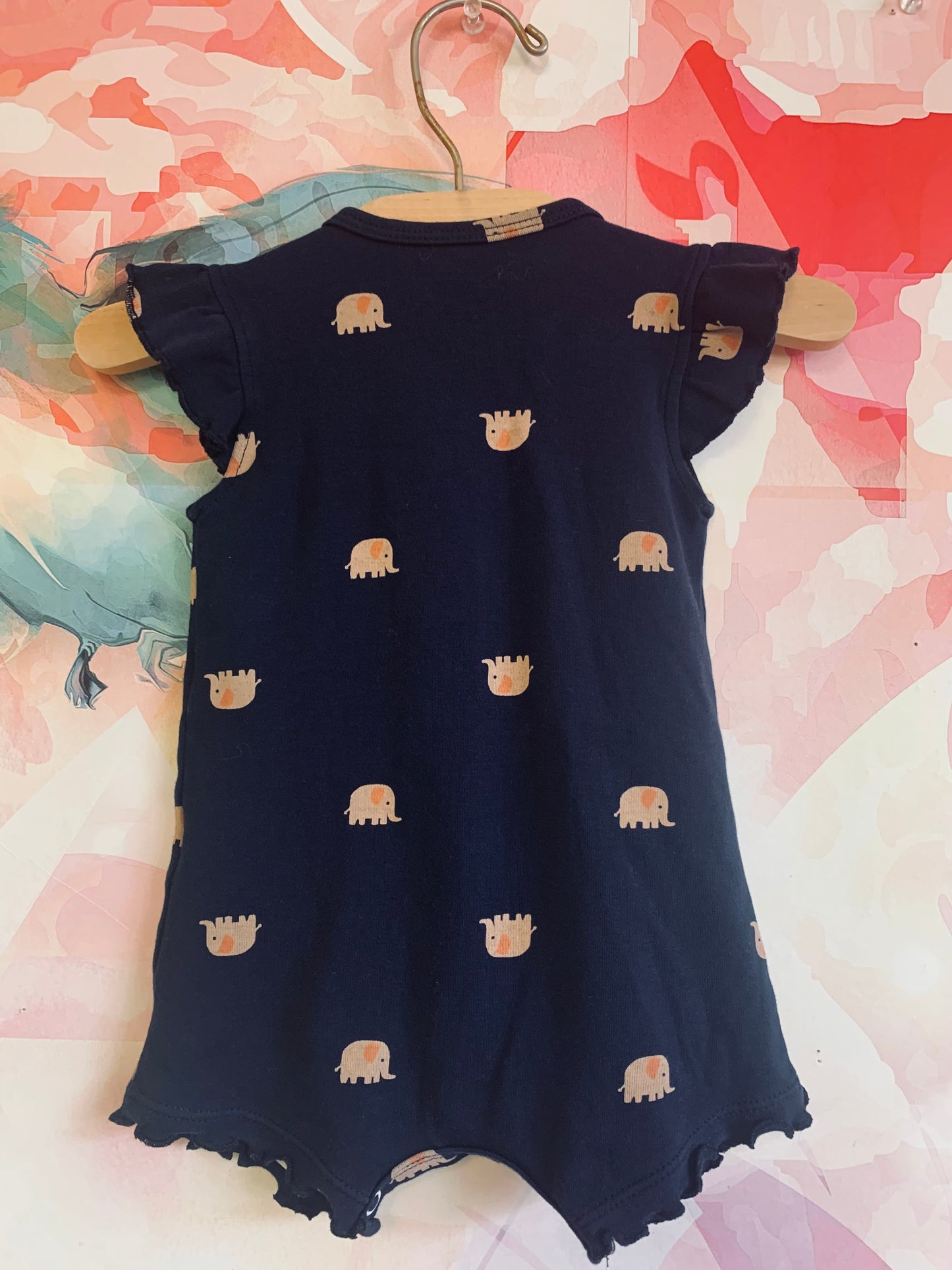 Minicoco blue flutter sleeve romper with pink elephants. Snap front. Size 3-6m