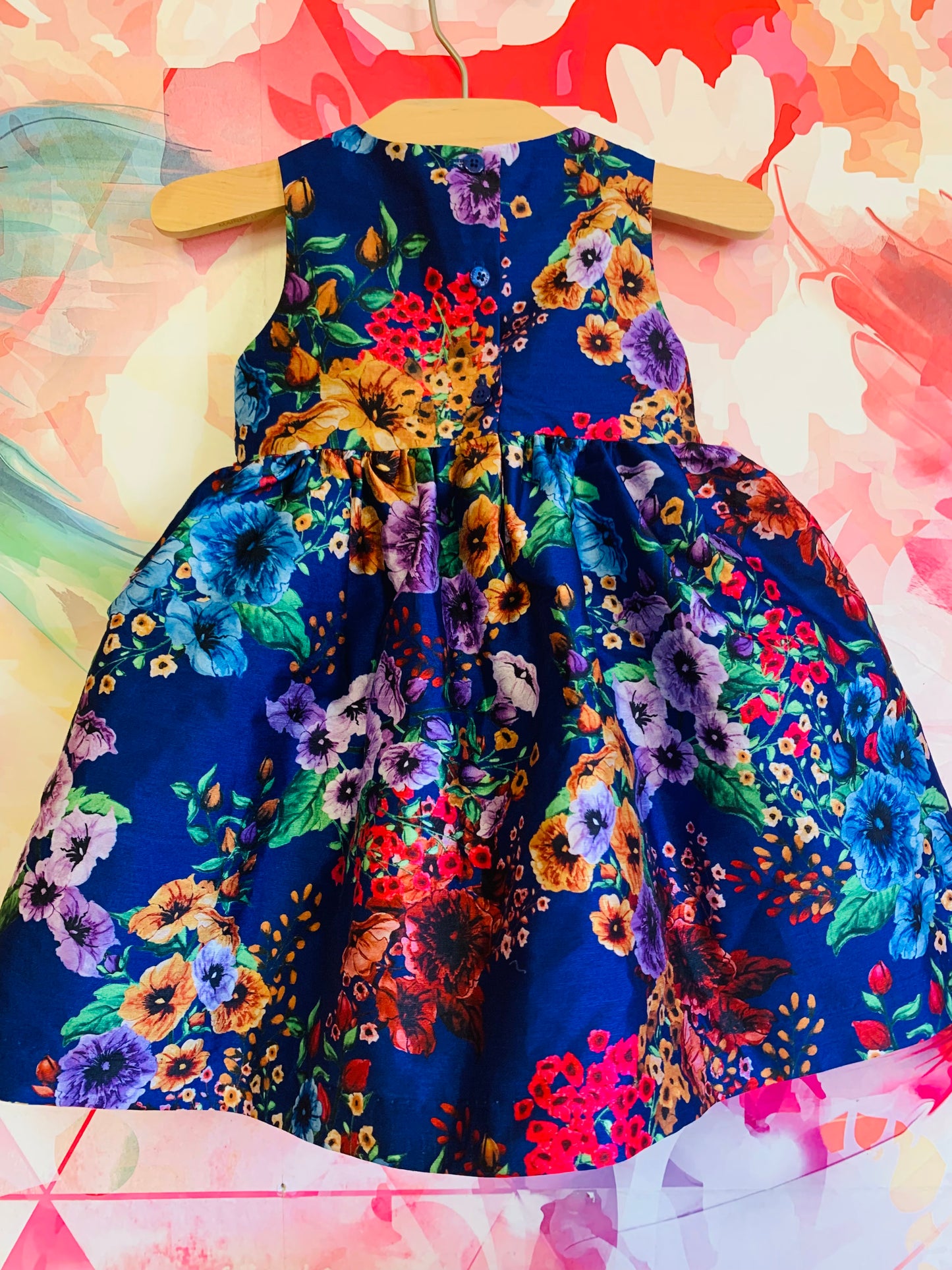 Pippa & Julie blue sleeveless dress with colorful flowers, red waistband, full tulle skirt. Size 12m