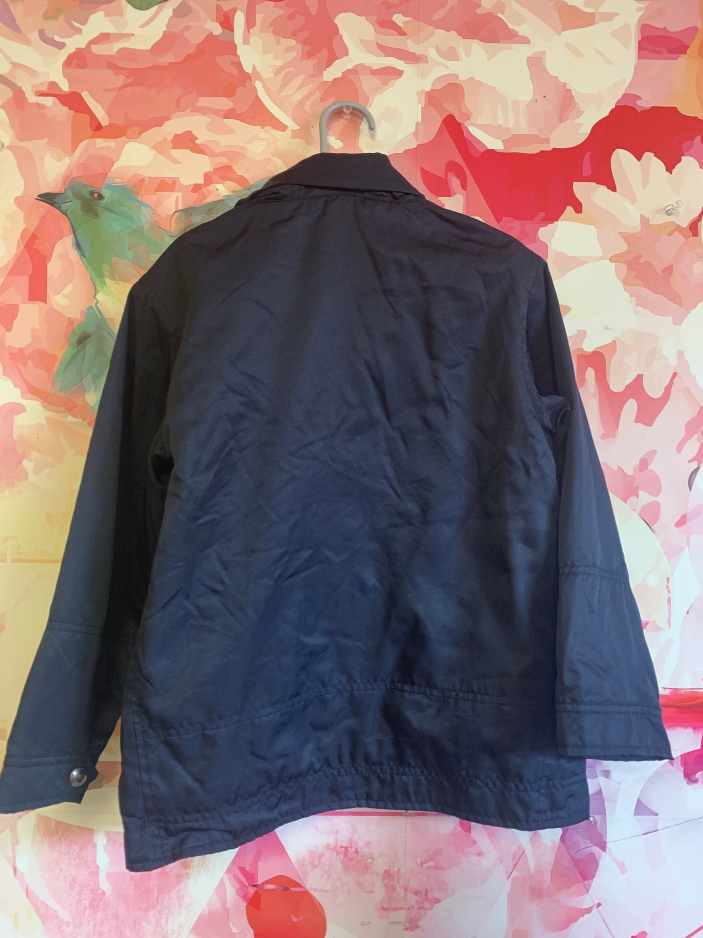 Polo by Ralph Lauren navy blue polyester jacket. Fleece lining and hood that can be rolled up and put inside collar. Size 6