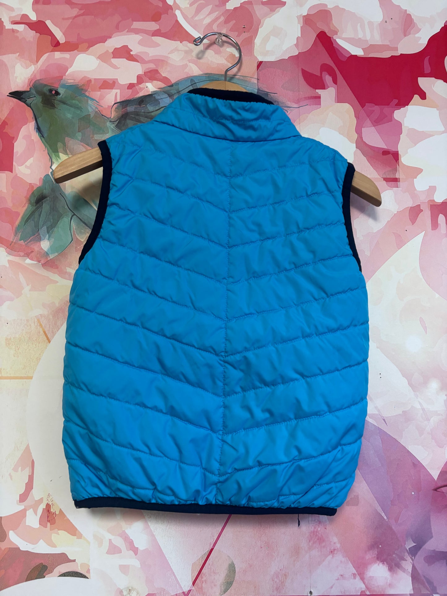 Columbia blue puffy vest with reversible fleece side. Size 4T