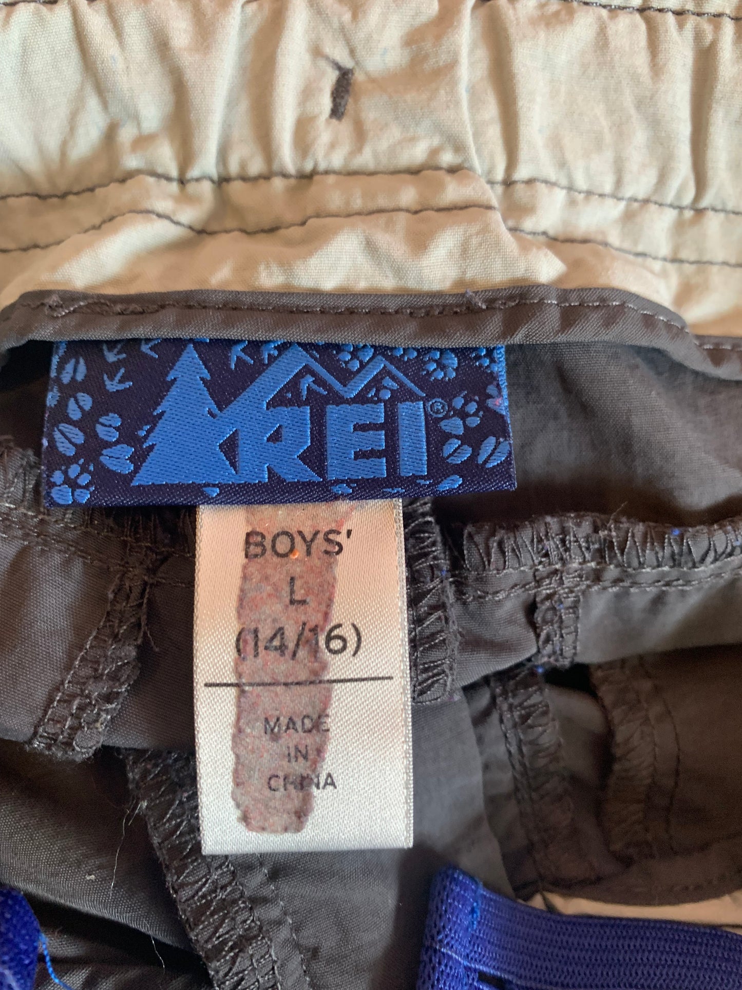 R.E.I. grey shorts. zip off bottoms of legs not included. Size 14/16.