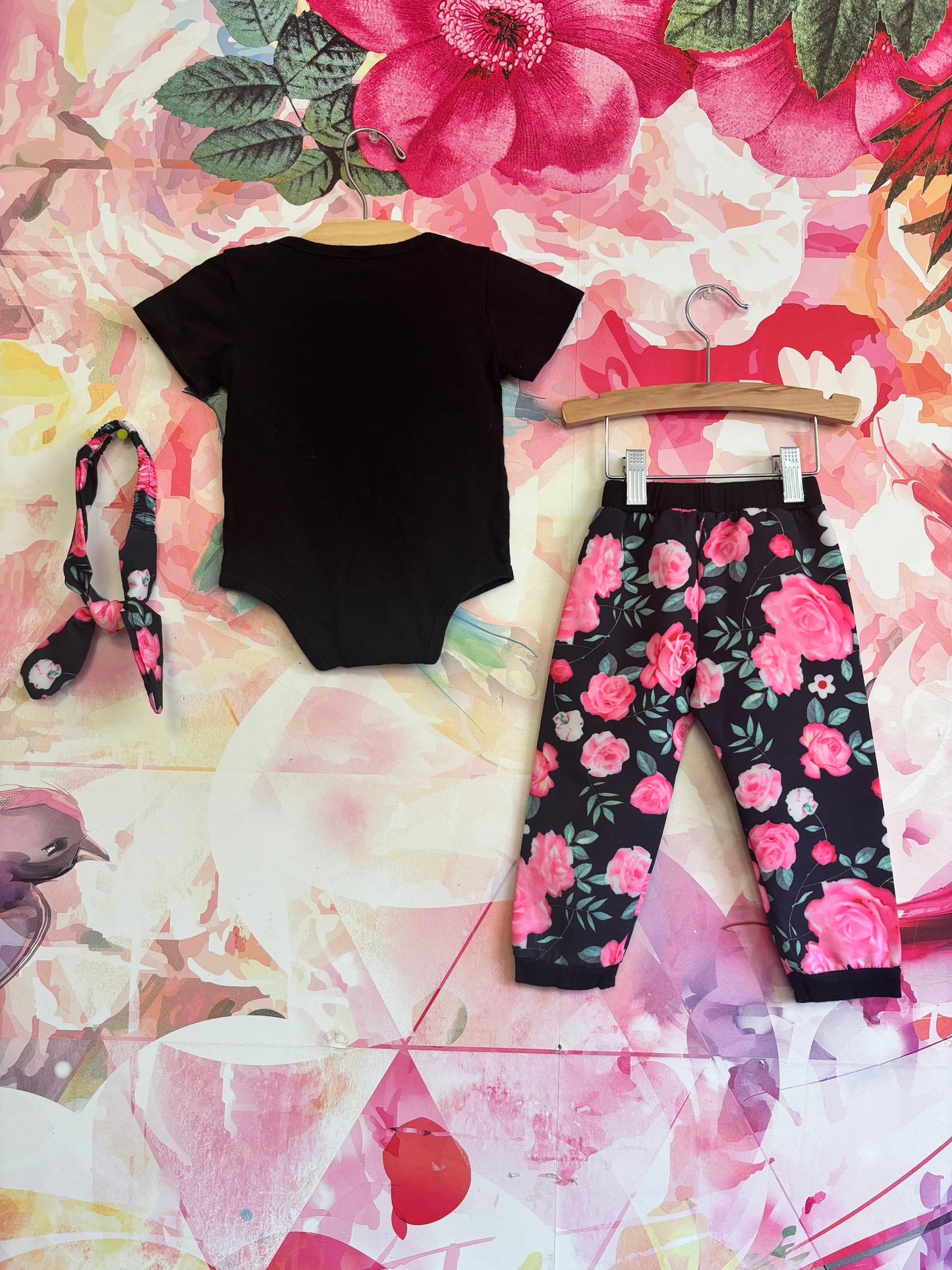 WILD ONE black & gold onesie and black, pink, green floral pants with matching headband. Size 2T.