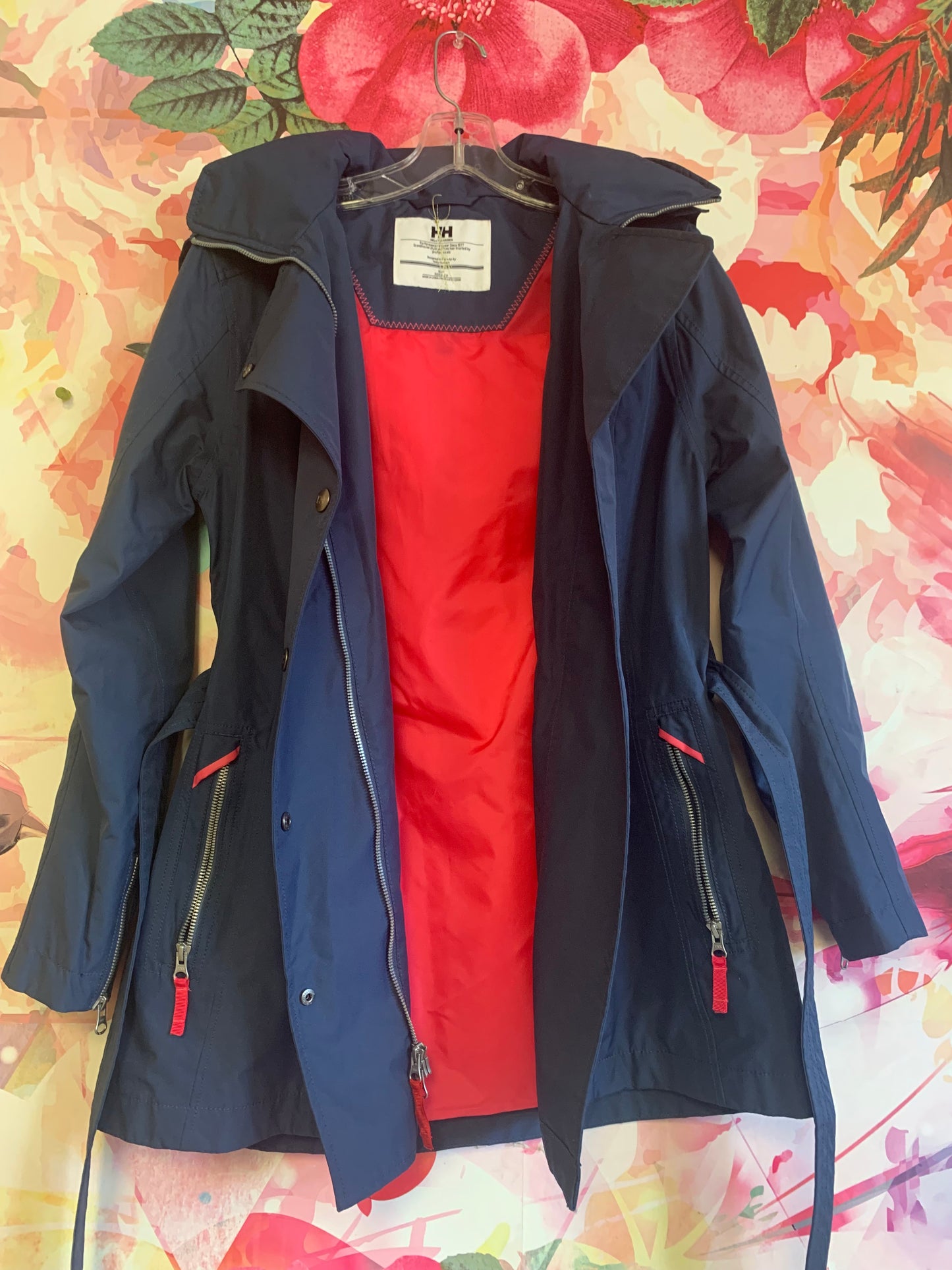 Helly Hansen blue hooded raincoat with bright pink lining. Size Adult S/P.
