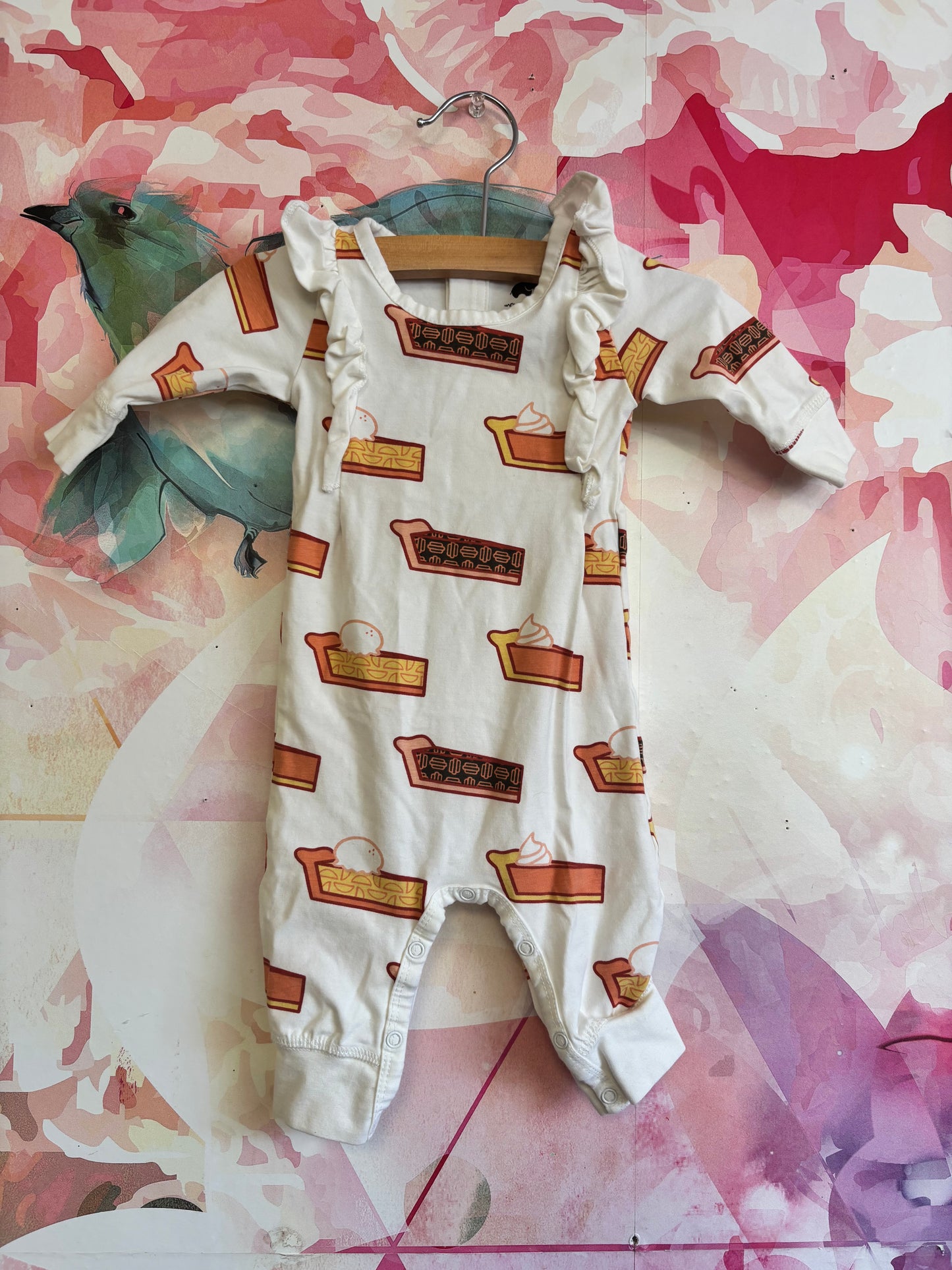 Monica & Andy long sleeve cream romper with ruffles on shoulders & Thanksgiving pies. Size 0-3m / NB