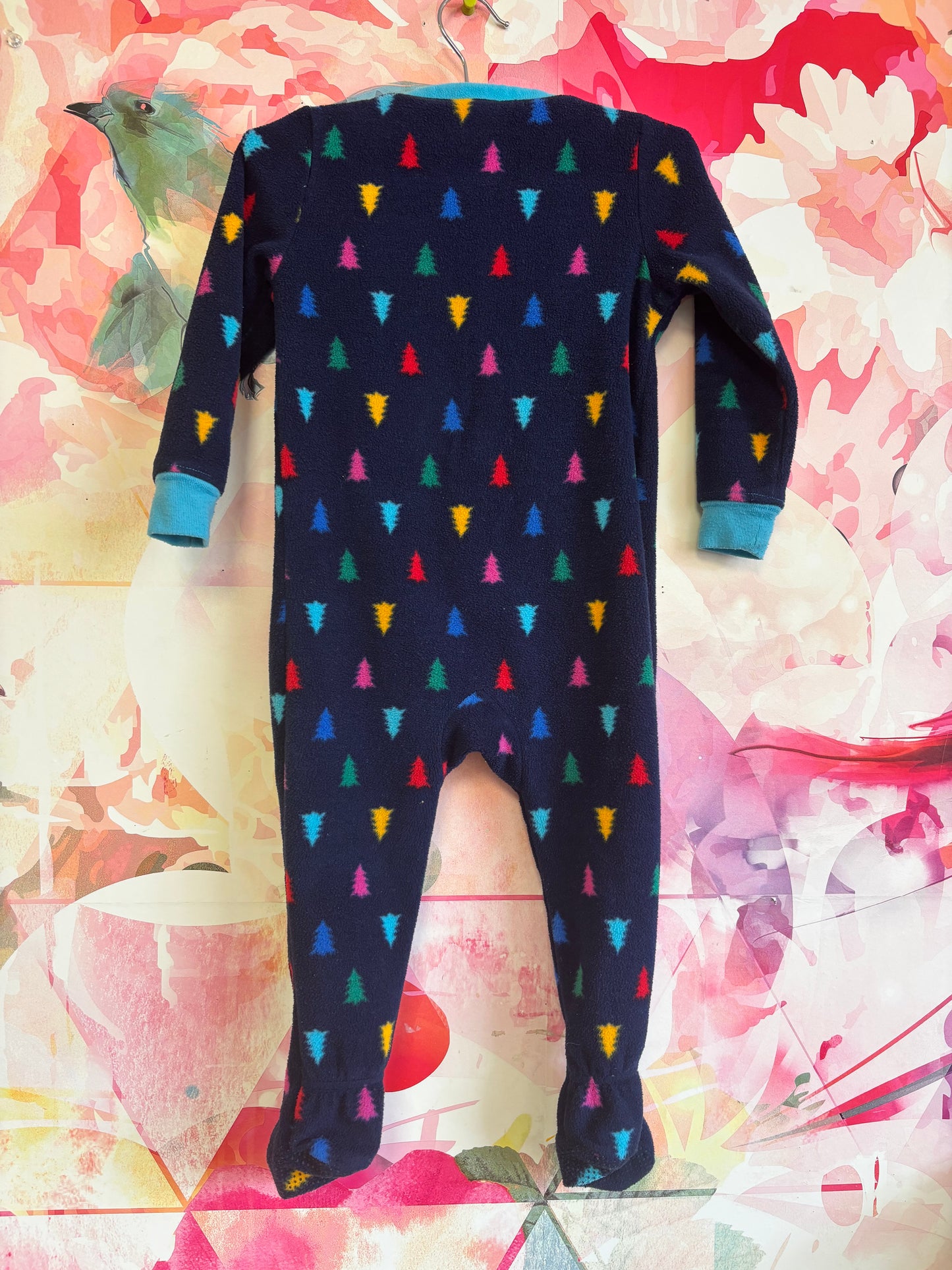 Lands’ End navy blue fleece footed romper with colorful pine trees. Size 18-24m.