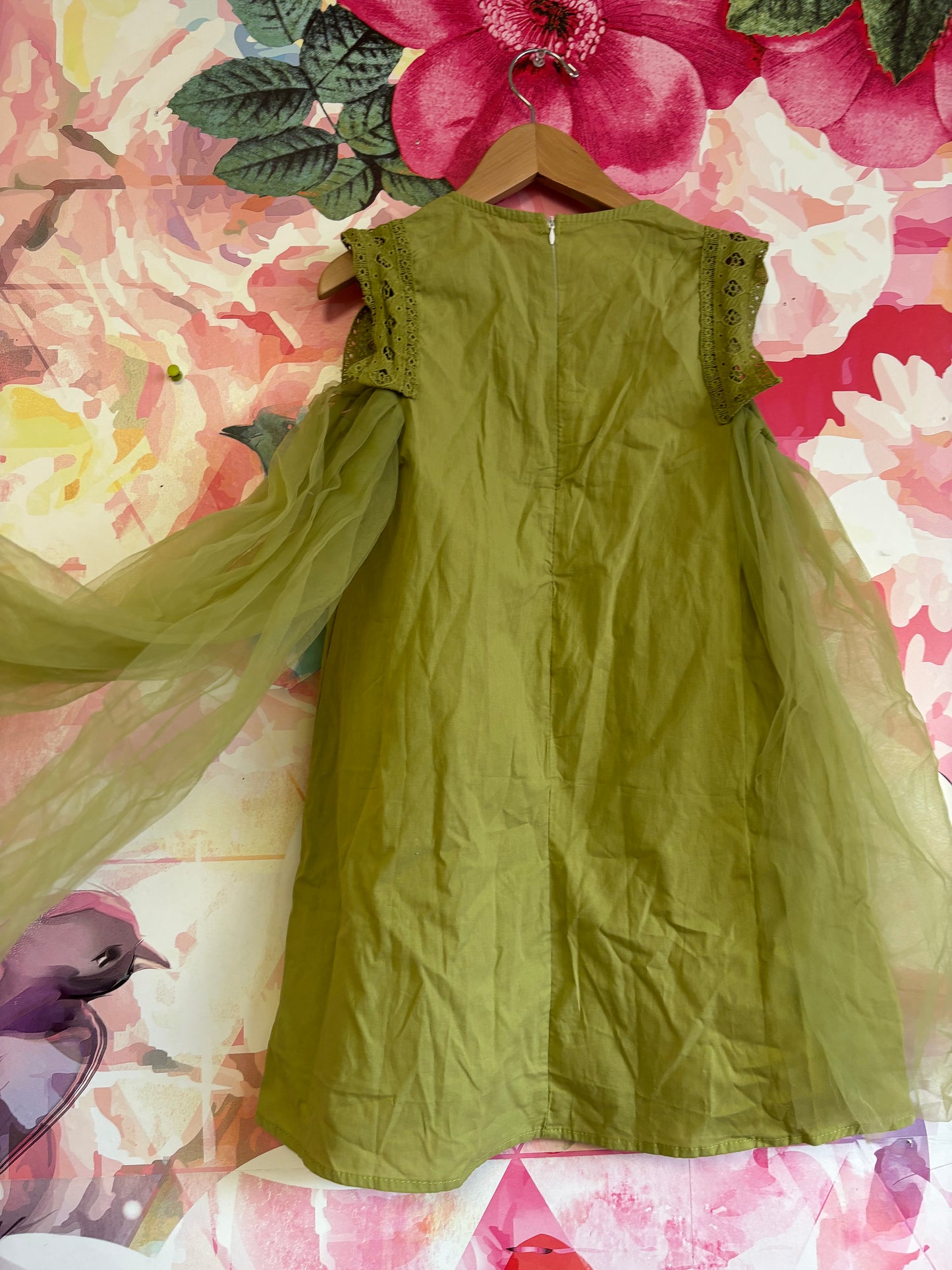 Boutique Child green dress with embroidered cap sleeves and tulle on sides. Zipper back. Size 5T / 6T