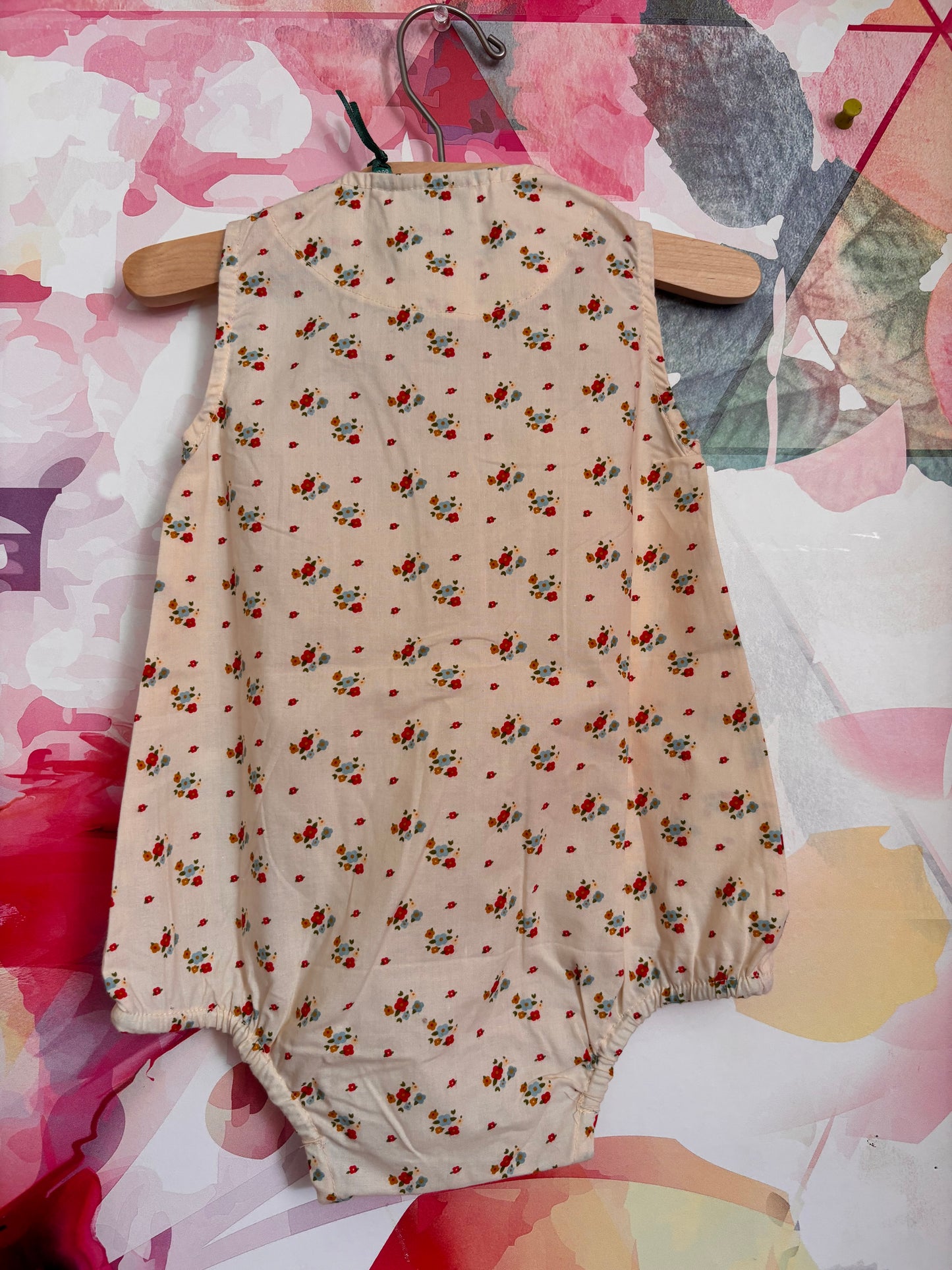 Little Green Radicals cream romper with tiny blue & red & gold flowers. Size 12-18m. NEW WITH TAGS