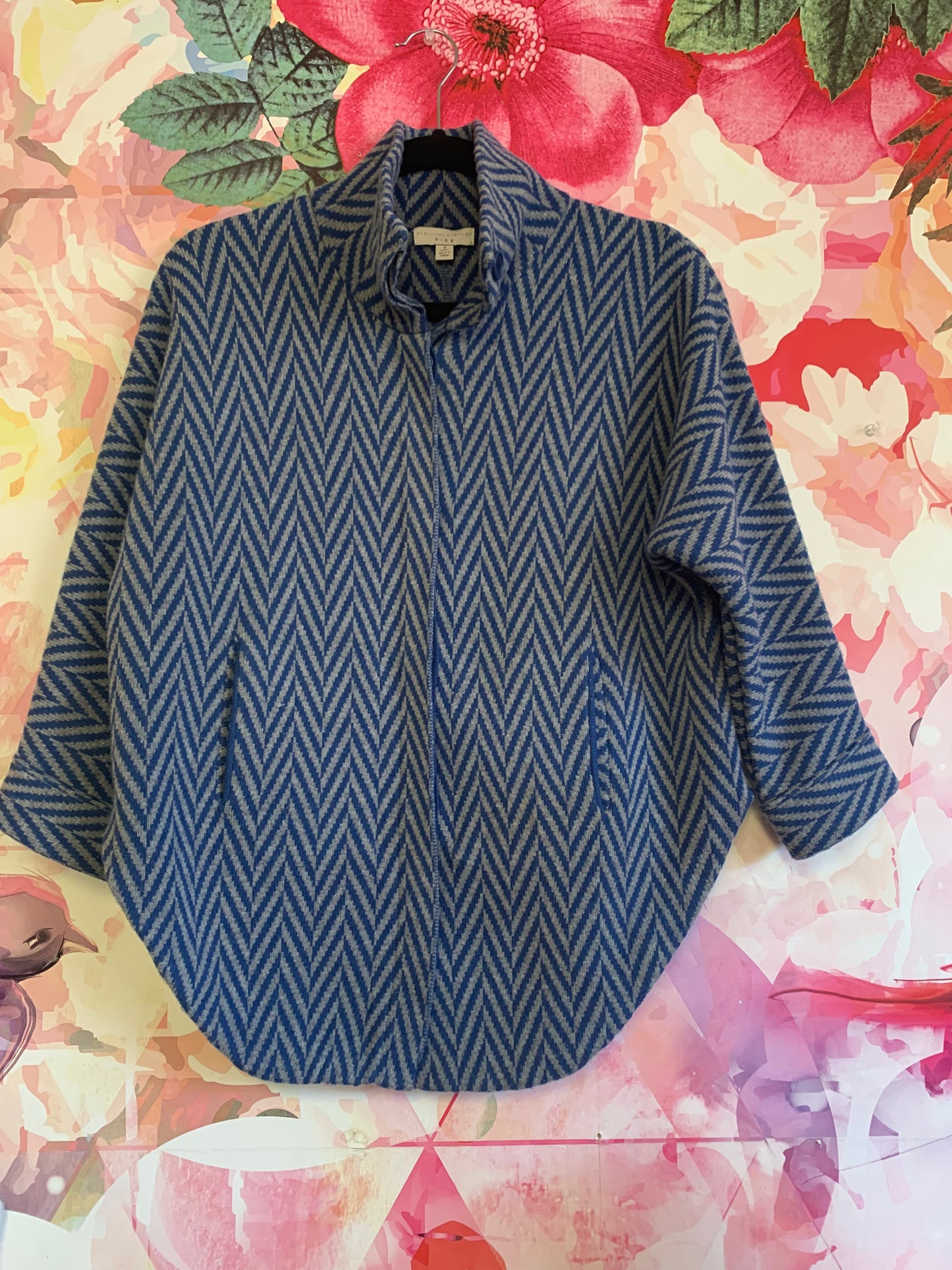 Stella McCartney Kids blue & grey button front sweater with pockets. 50% wool. Size 8