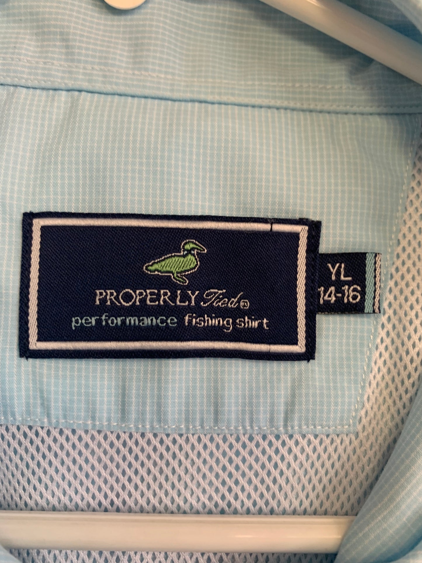 Properly Tied light blue Performance Fishing Shirt. Long sleeve button down shirt. Size 14/16.