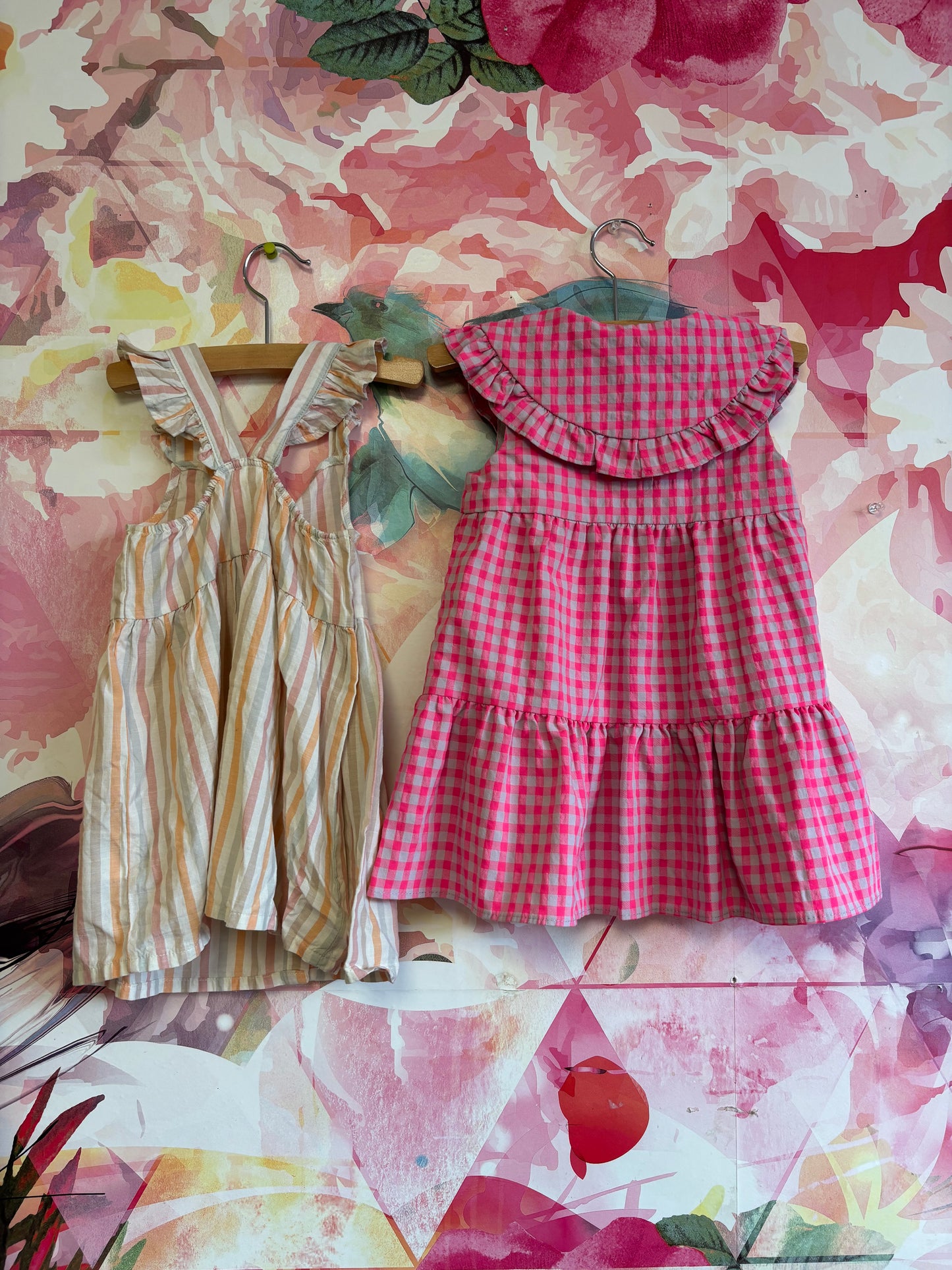 Dress Bundle. H&M cream stripe button front dress with flutter straps. Size 18m Zara pink & grey checkered dress with front buttons and ruffle Peter Pan collar. Size 18-24m