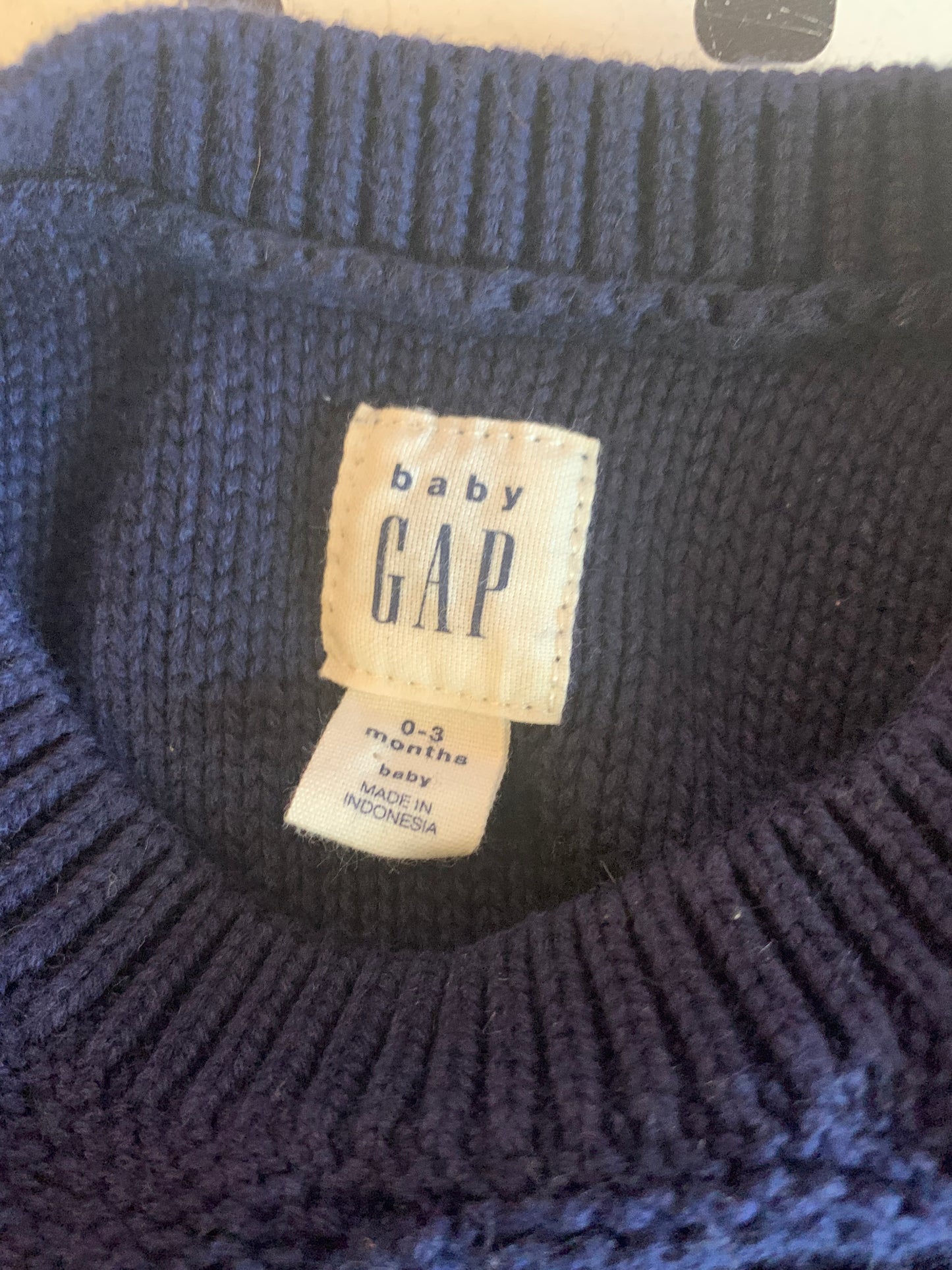 Baby Gap navy blue knit crewneck sweater with shoulder buttons. Size 0-3m / NB