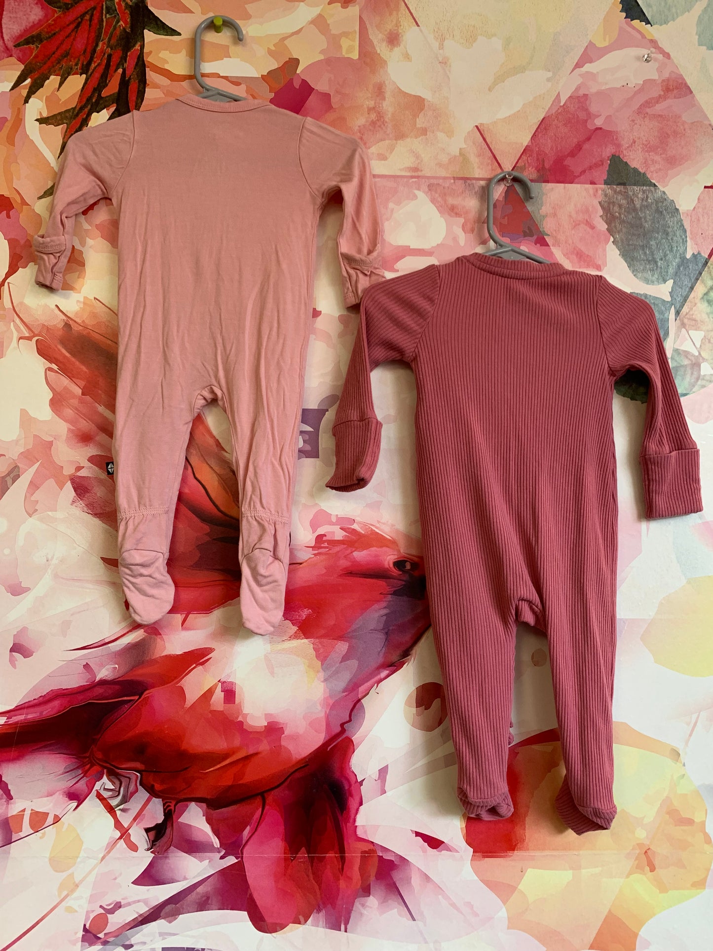 Kyte baby light pink bamboo footed romper with fold over hands. Baby Gap dark pink ribbed romper with zipper ruffle. Size 0-3m / NB
