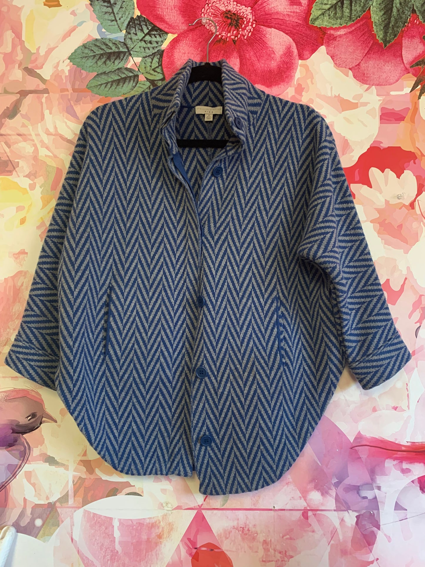 Stella McCartney Kids blue & grey button front sweater with pockets. 50% wool. Size 8