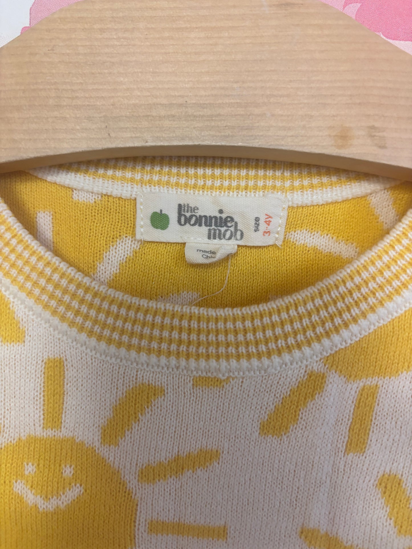 The Bonnie Mob cream & yellow knit short sleeve dress with stripes & smiling suns. Size 3T / 4T
