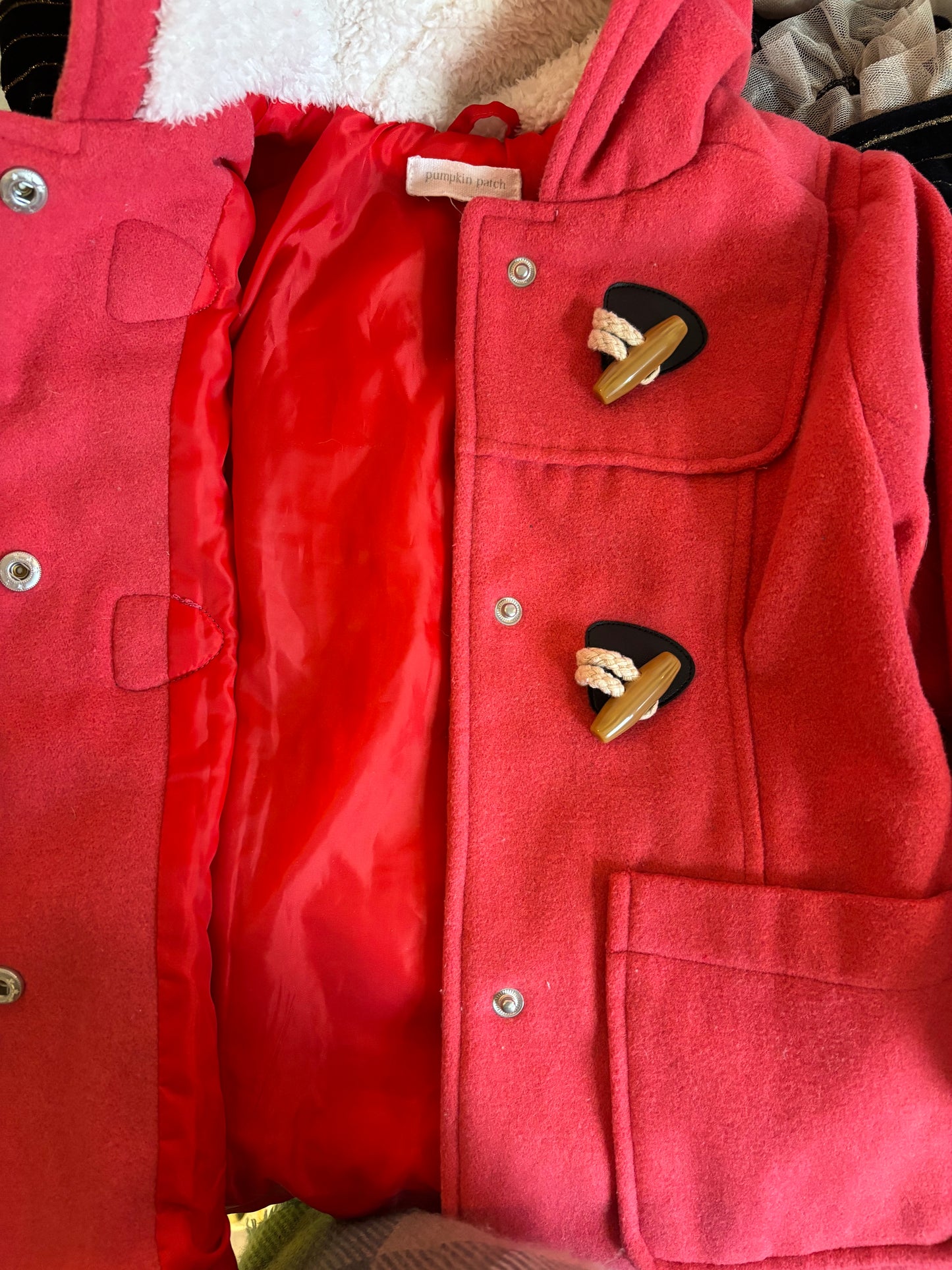 Pumpkin Patch red wool coat with fleece lined hood. Toggle & snap closures. Size 2T / 3T.