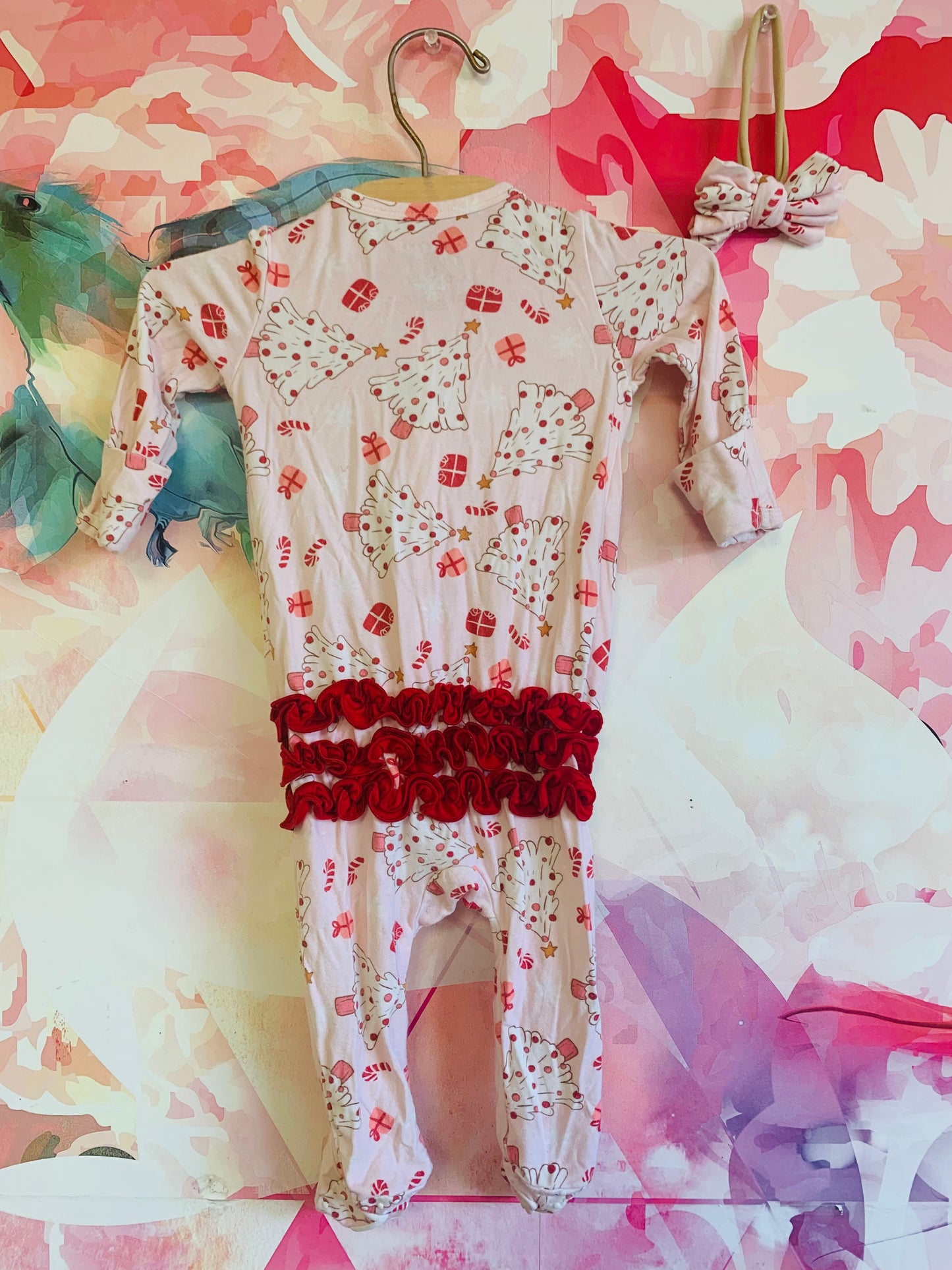 Caden Lane pink & red long sleeve romper with Xmas trees & presents. Red ruffle on back. Size 0-3m / NB