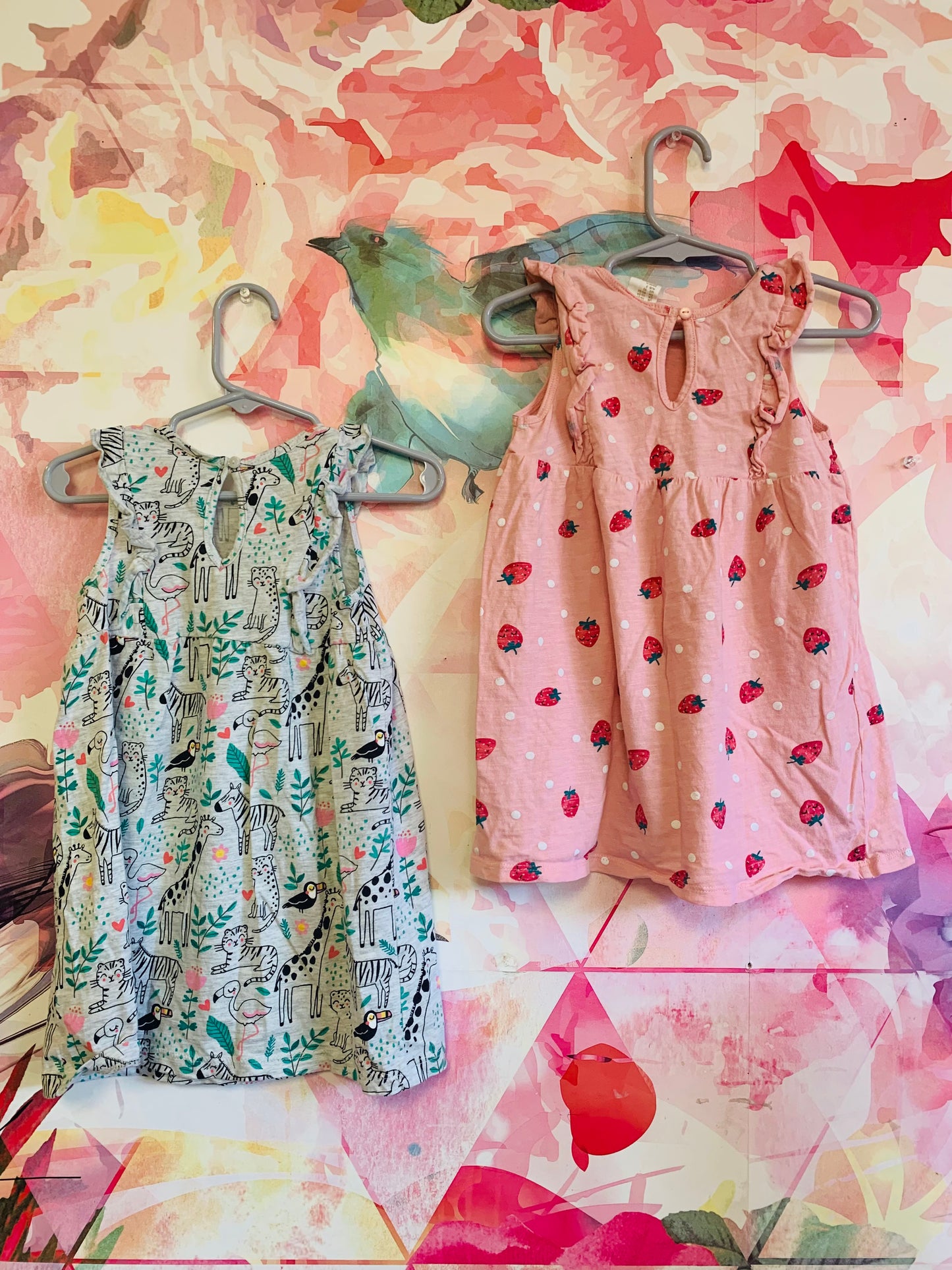 H&M sleeveless dresses. Pink with strawberries & grey with animals. Size 18-24m.