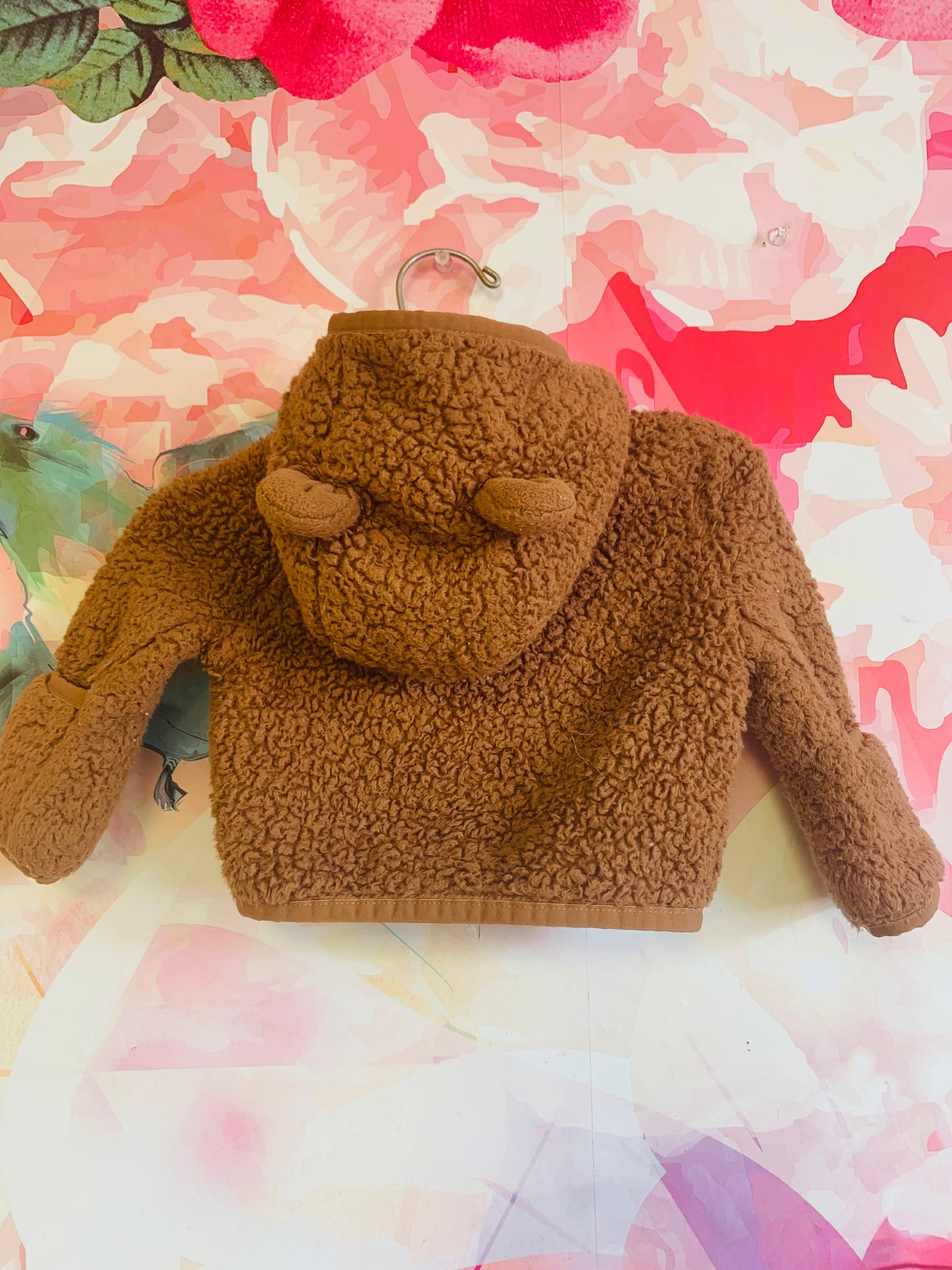 The North Face brown zip up hoodie. Size 0-3m / NB