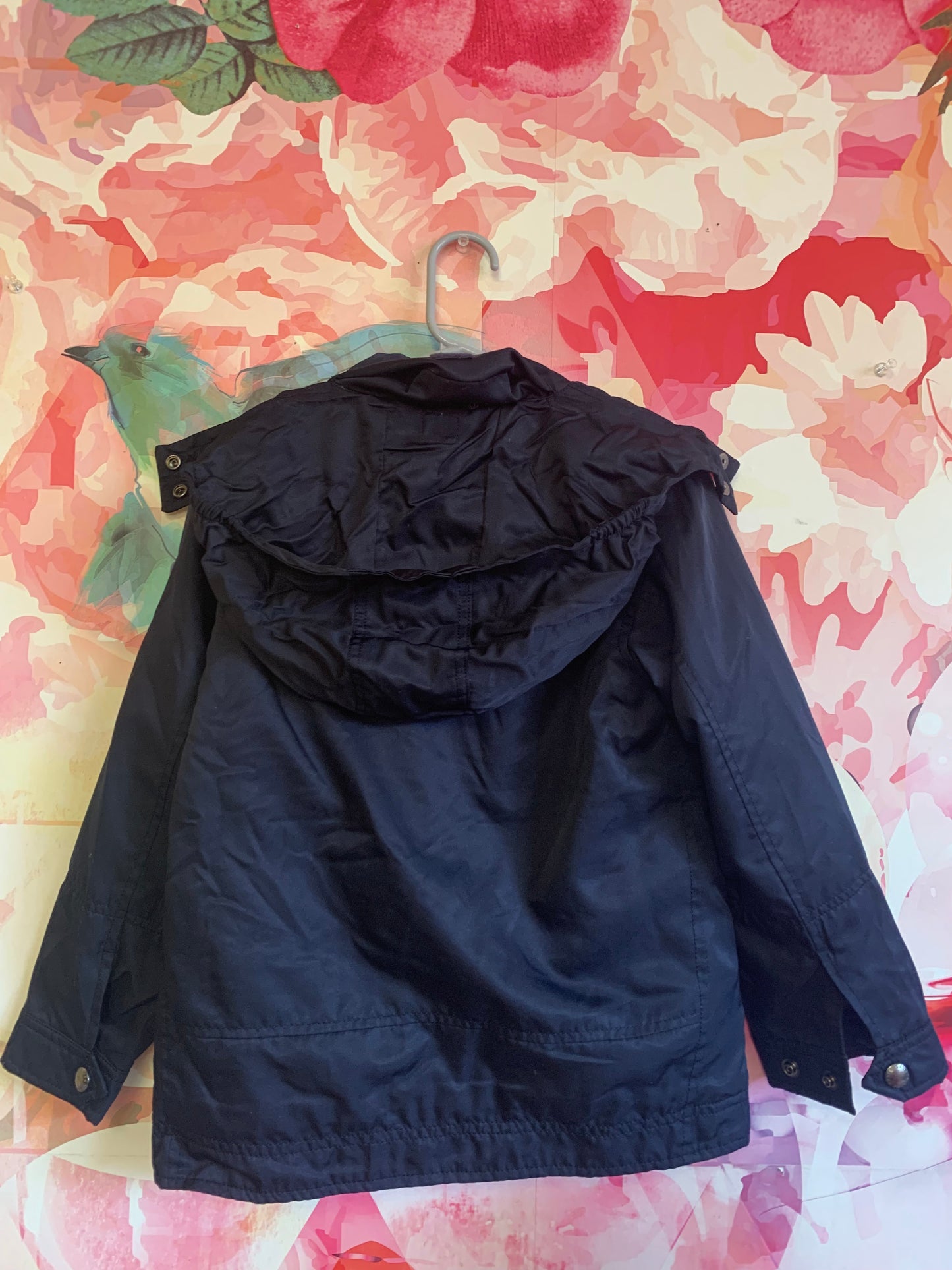 Polo by Ralph Lauren navy blue polyester jacket. Fleece lining and hood that can be rolled up and put inside collar. Size 6