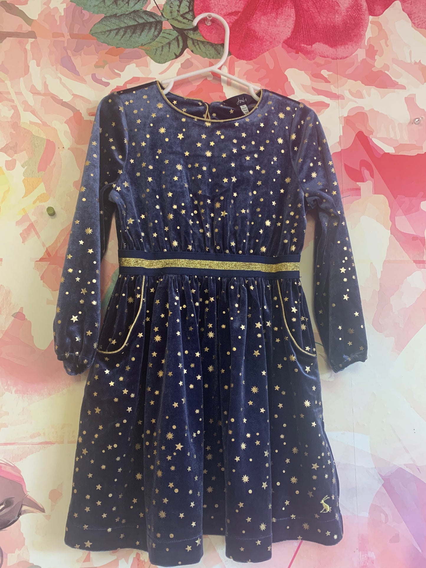 Joules blue velvet long sleeve dress with gold stars. Elastic waist, two side pockets and two star buttons at back. Size 3T.