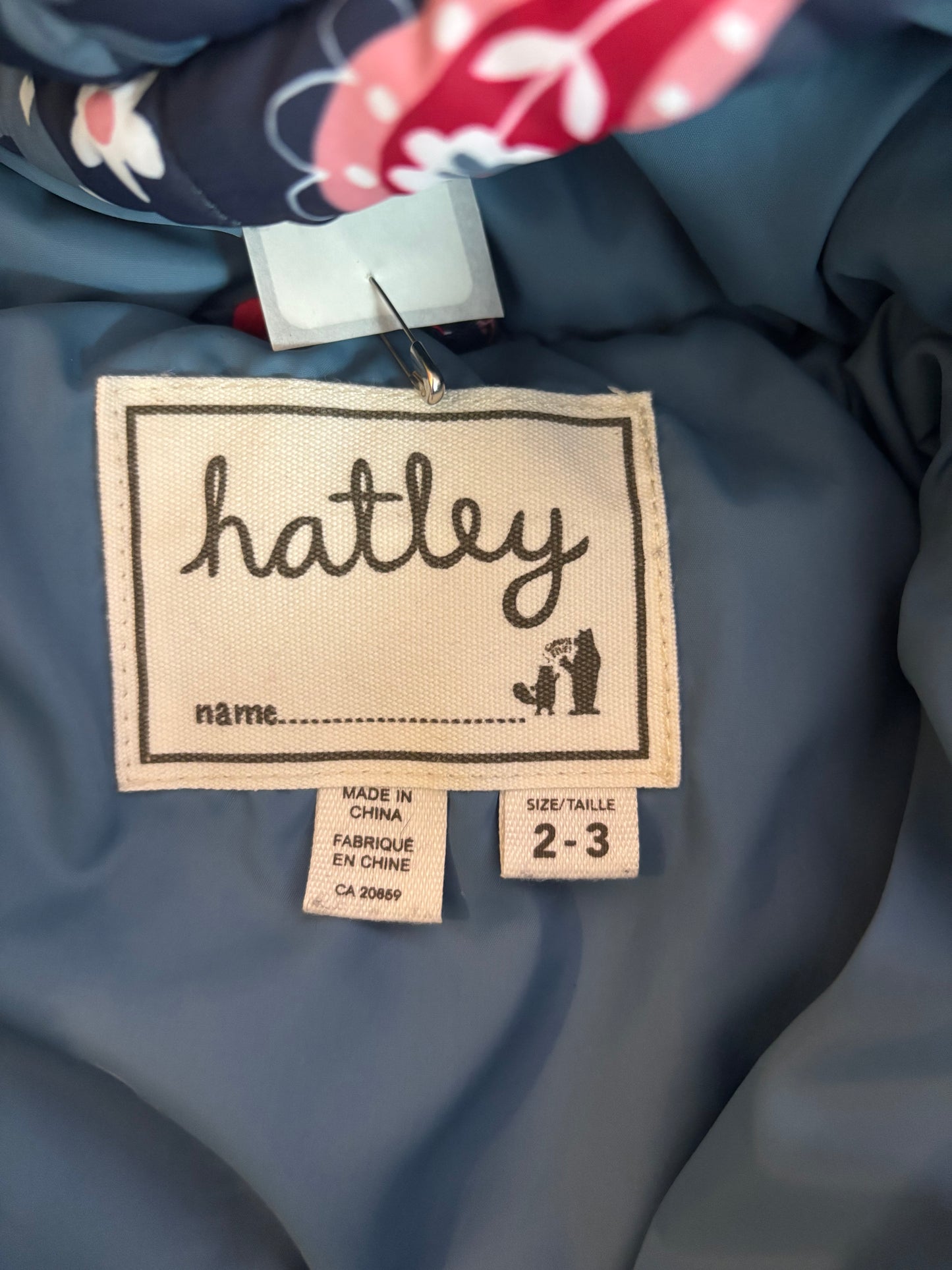 Hatley blue hooded snow suit with blue, red,pink, white birds & flowers. Size 2T.