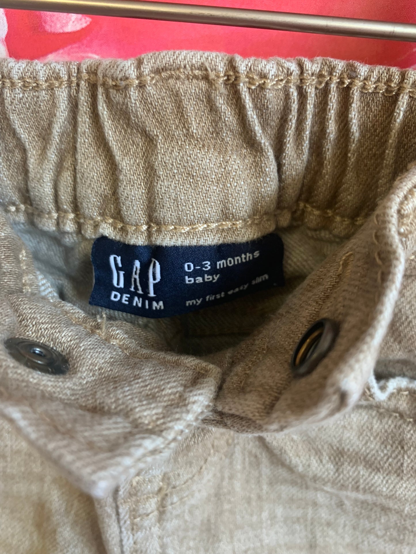 Baby Gap cream & grey knit sweater with shoulder buttons. Khaki jeans with snap closure. Size 0-3m / NB