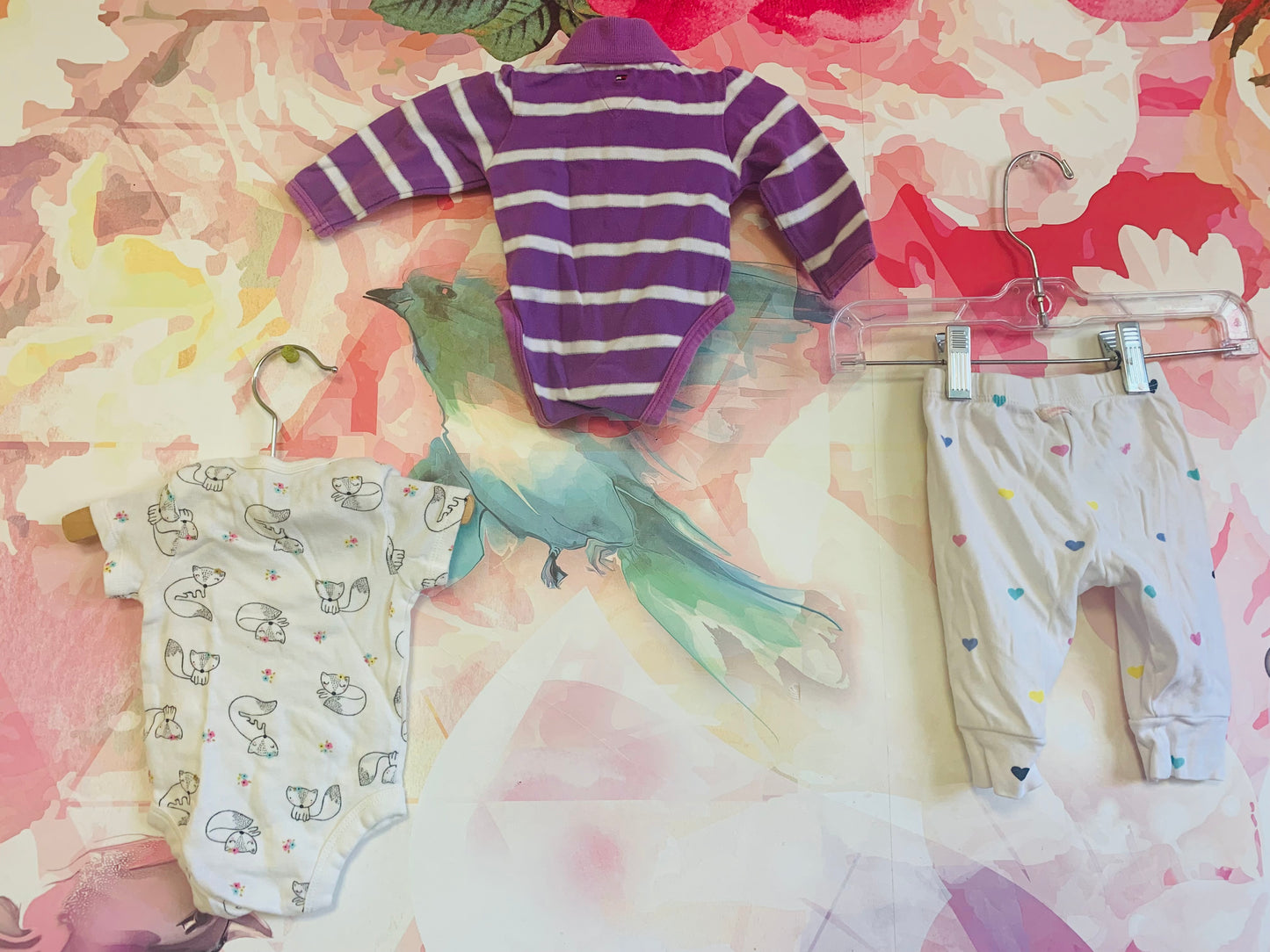 Newborn bundle! Gerber NB onesie with foxes & flowers, Baby Gap white leggings with colorful hearts, Tommy Hilfiger purple & white stripe long sleeve onesie with collar. Size 0-3m / NB