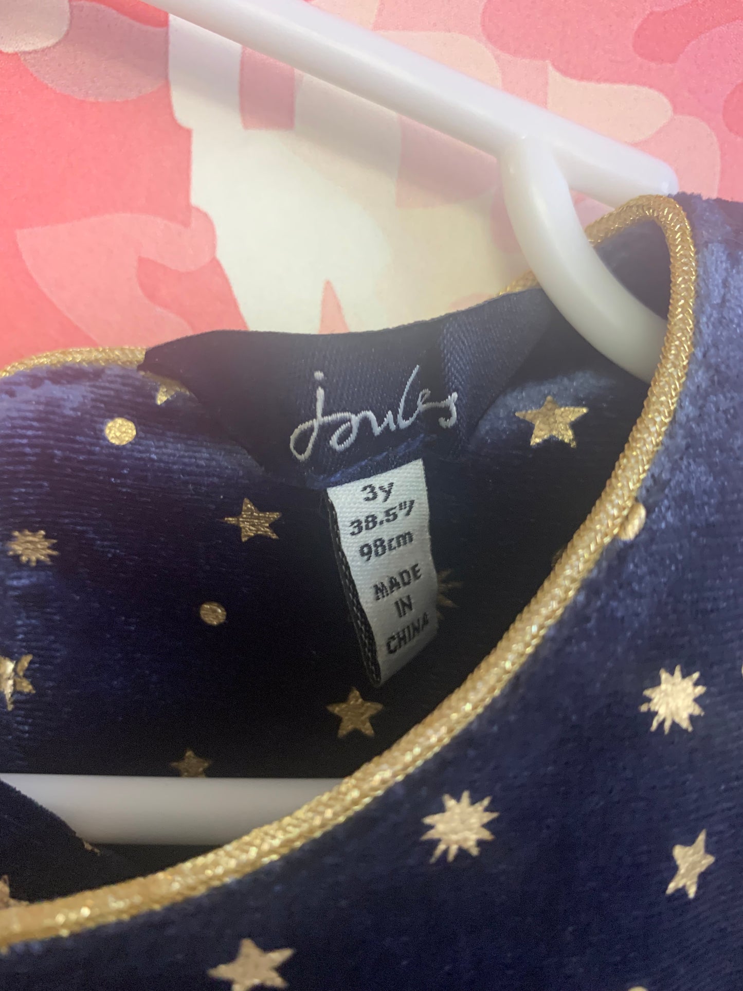 Joules blue velvet long sleeve dress with gold stars. Elastic waist, two side pockets and two star buttons at back. Size 3T.