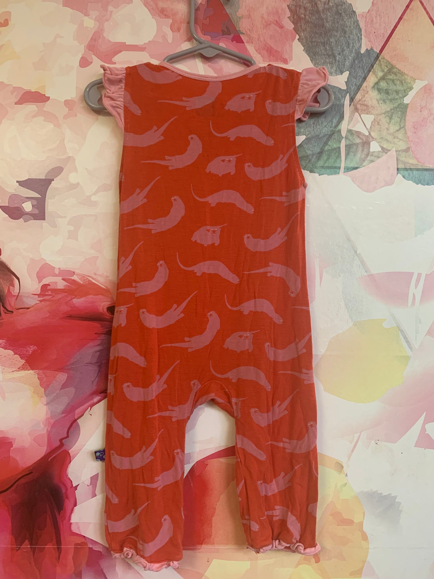 Kickee Pants short sleeve orange romper with pink otters & snaps. Made from bamboo. Size 2T