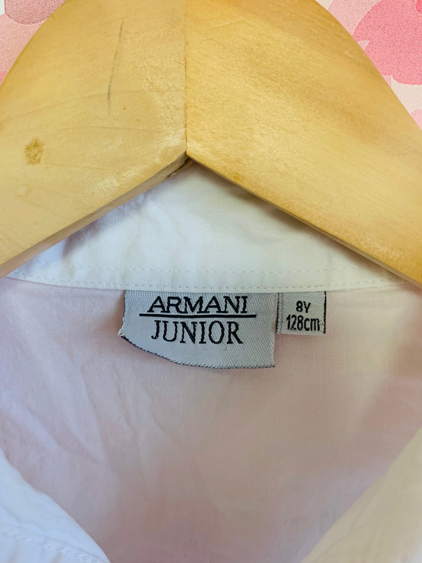 Armani Junior white button down cotton collared blouse with ruffle along clear buttons. Extra button attached - see pics. Size 8.