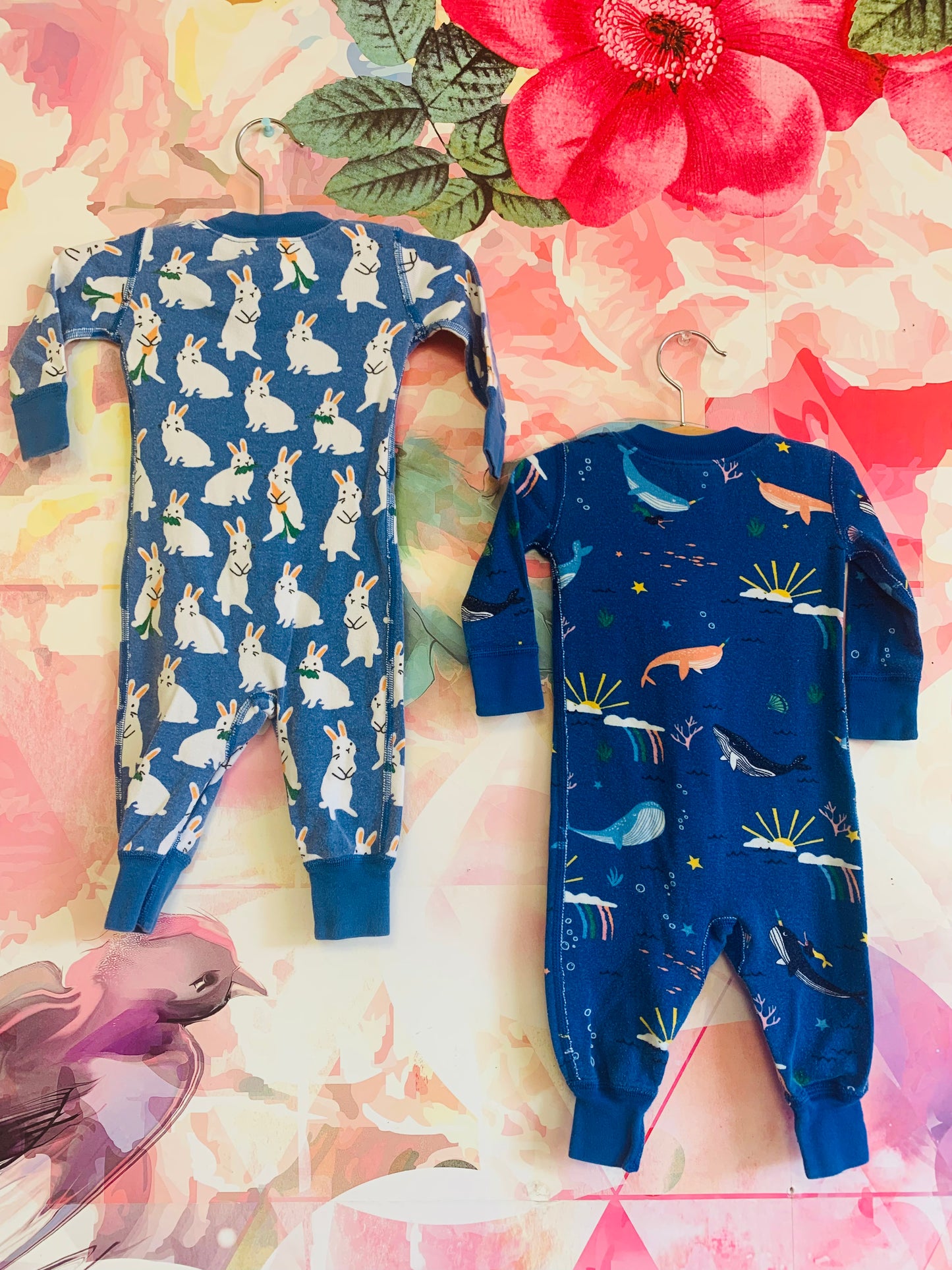 Two Hanna Andersson blue long sleeve rompers. Bunnies & carrots and orca, whales, mermaids, rainbows. Size3-6m.