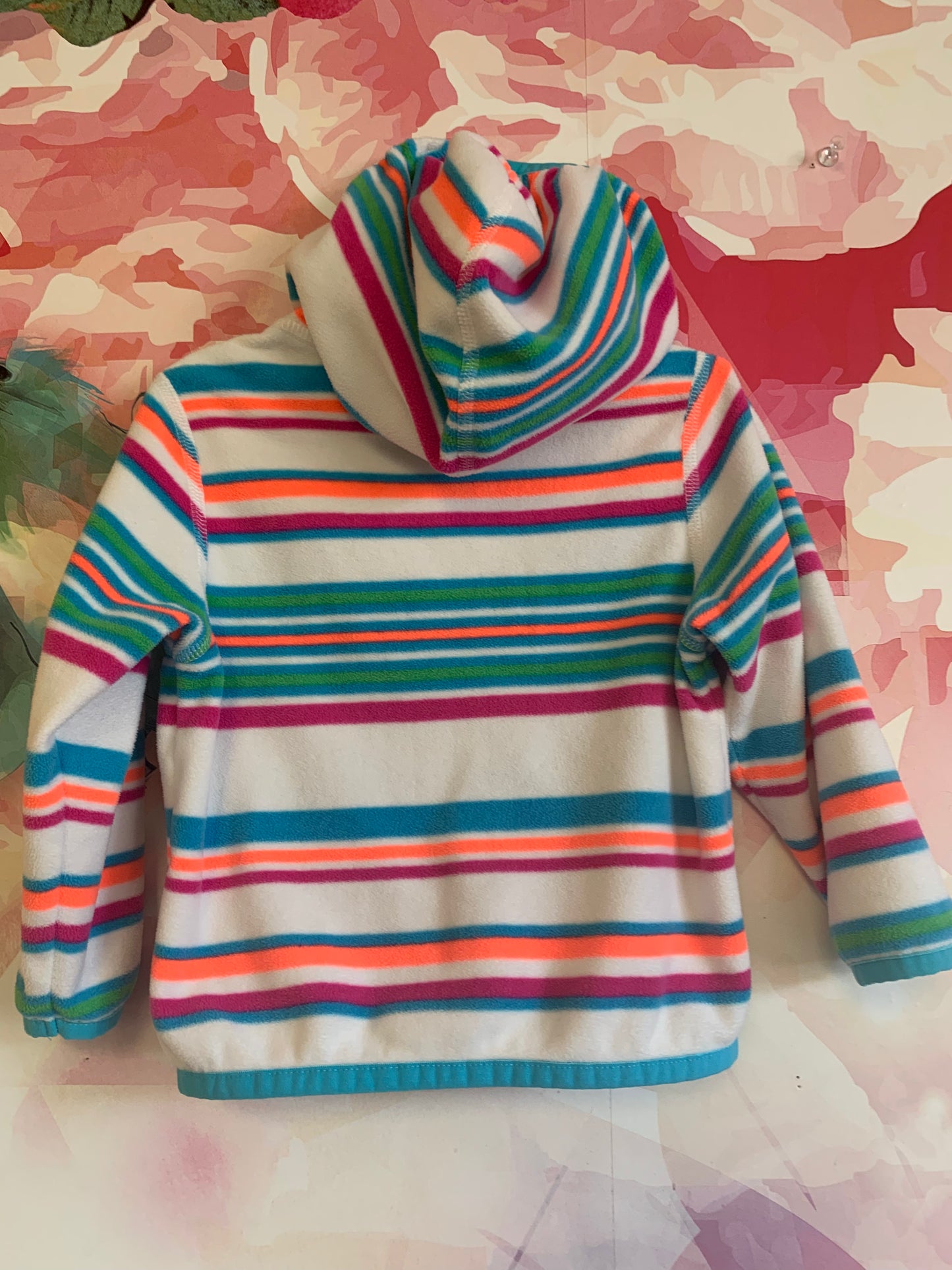 The North Face blue, purple, orange, green striped zip up fleece hoodie with pockets. Size 6-12m.