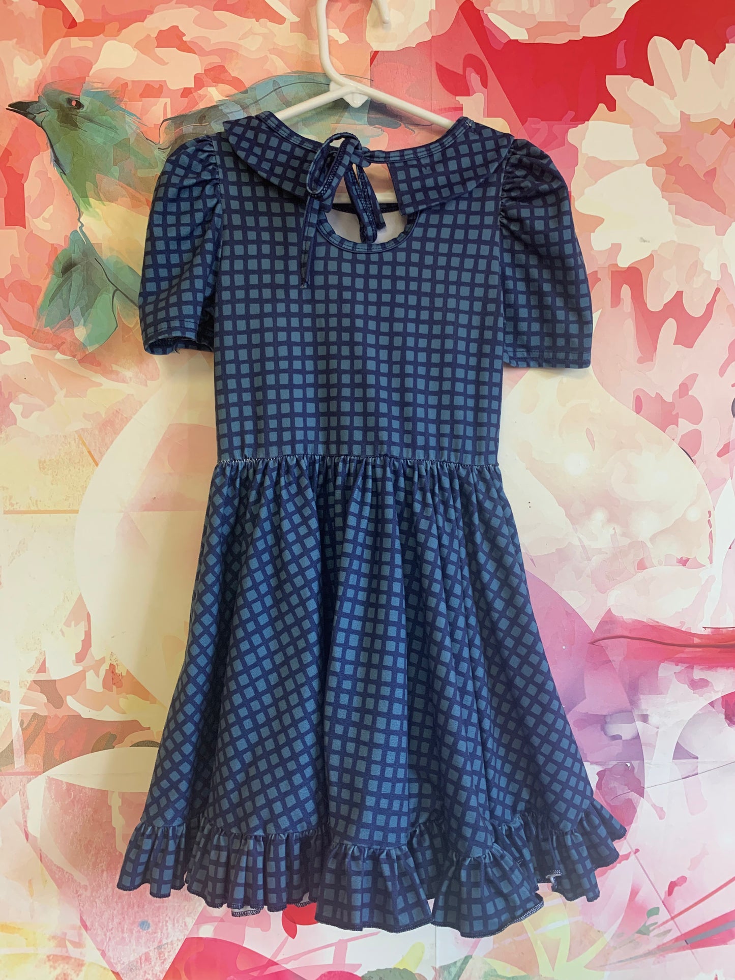 girlhood blue short sleeve dress with Peter pan collar & full skirt. Keyhole tie at back or neck. Size 4T / 5T