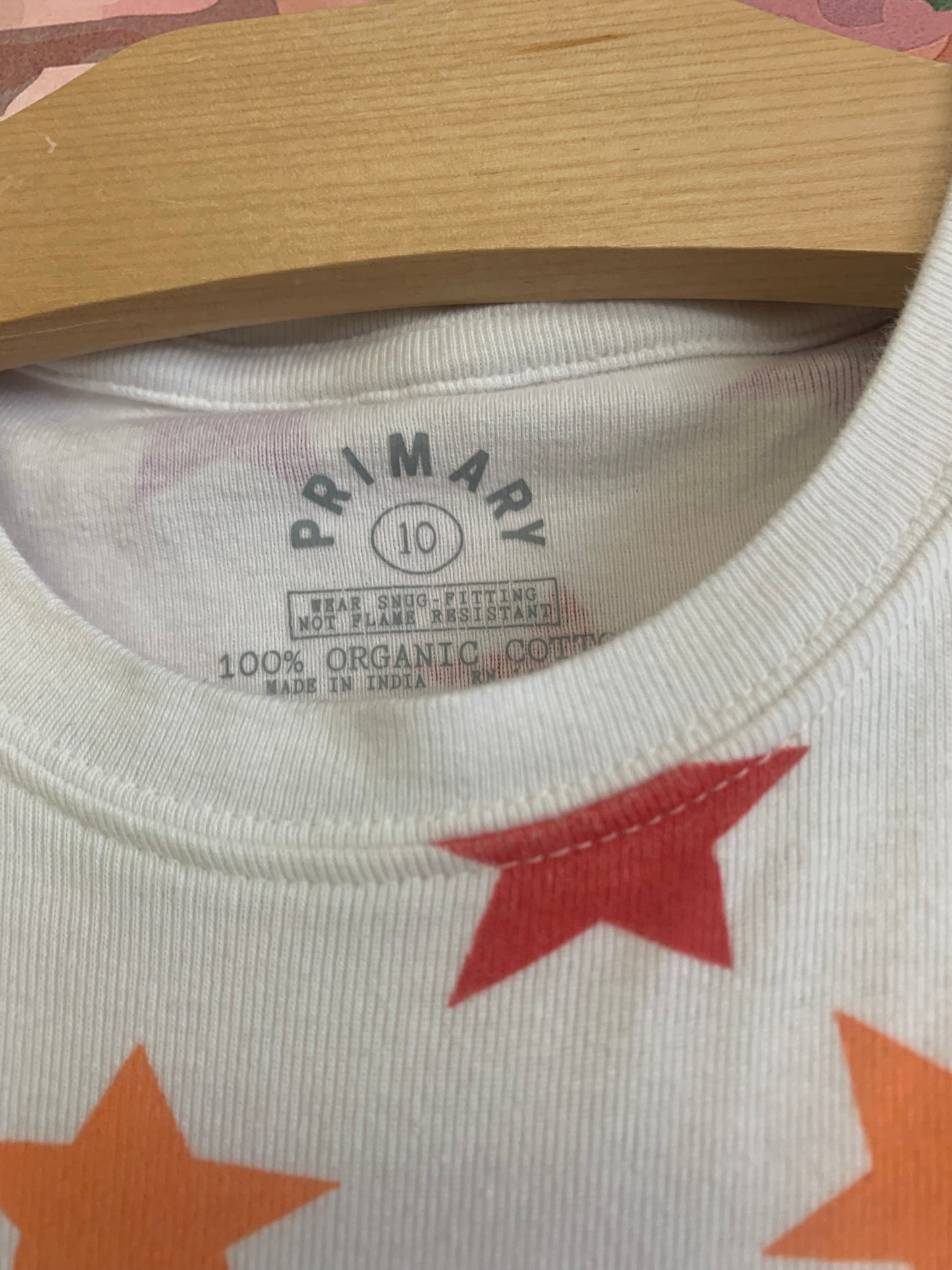 Primary multi colored stars pajama set with short sleeve top. Size 10