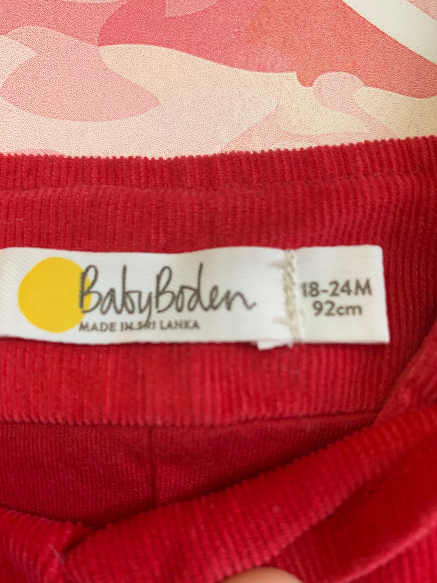 Baby Boden red corduroy romper with brown reindeer pockets. Size 18-24m