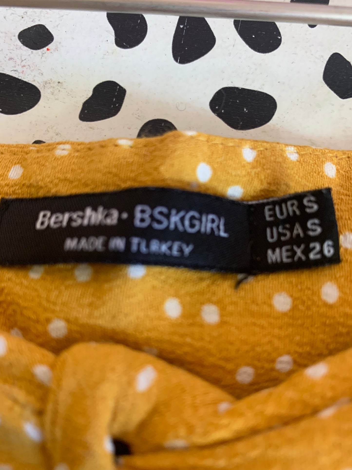 Bershka BSKGIRL yellow short skirt white polka dots & black buttons down front. Size 2T