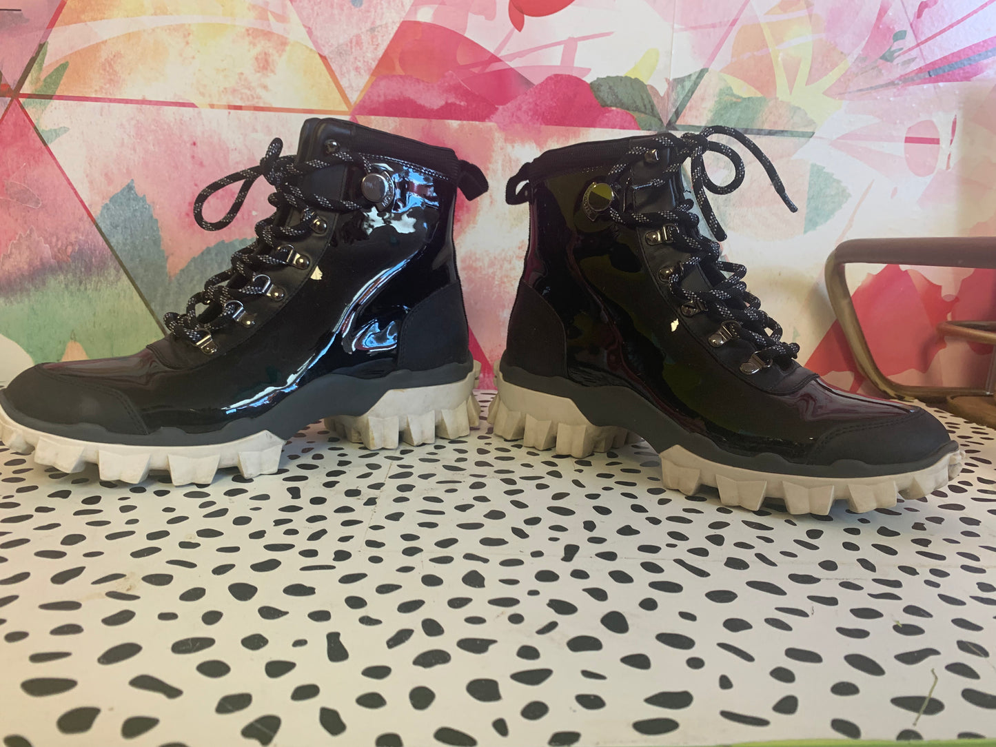 Ler Moncler black lace up boots with white treads. Size 8.5 / 39. Made in Italy.